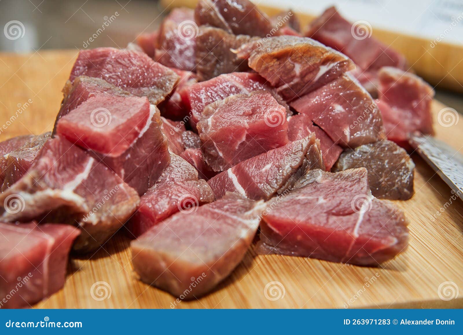 Chef Cuts the Beef Meat into Cubes for Cooking Stock Image Image of