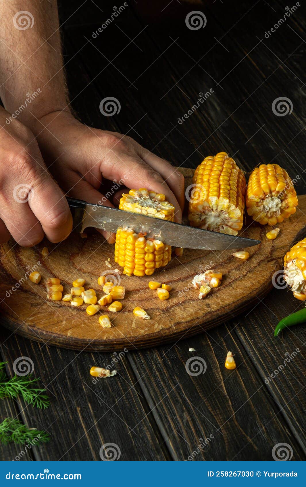 The Chef Cuts Corn with a Knife. Maize is an Excellent Dietary