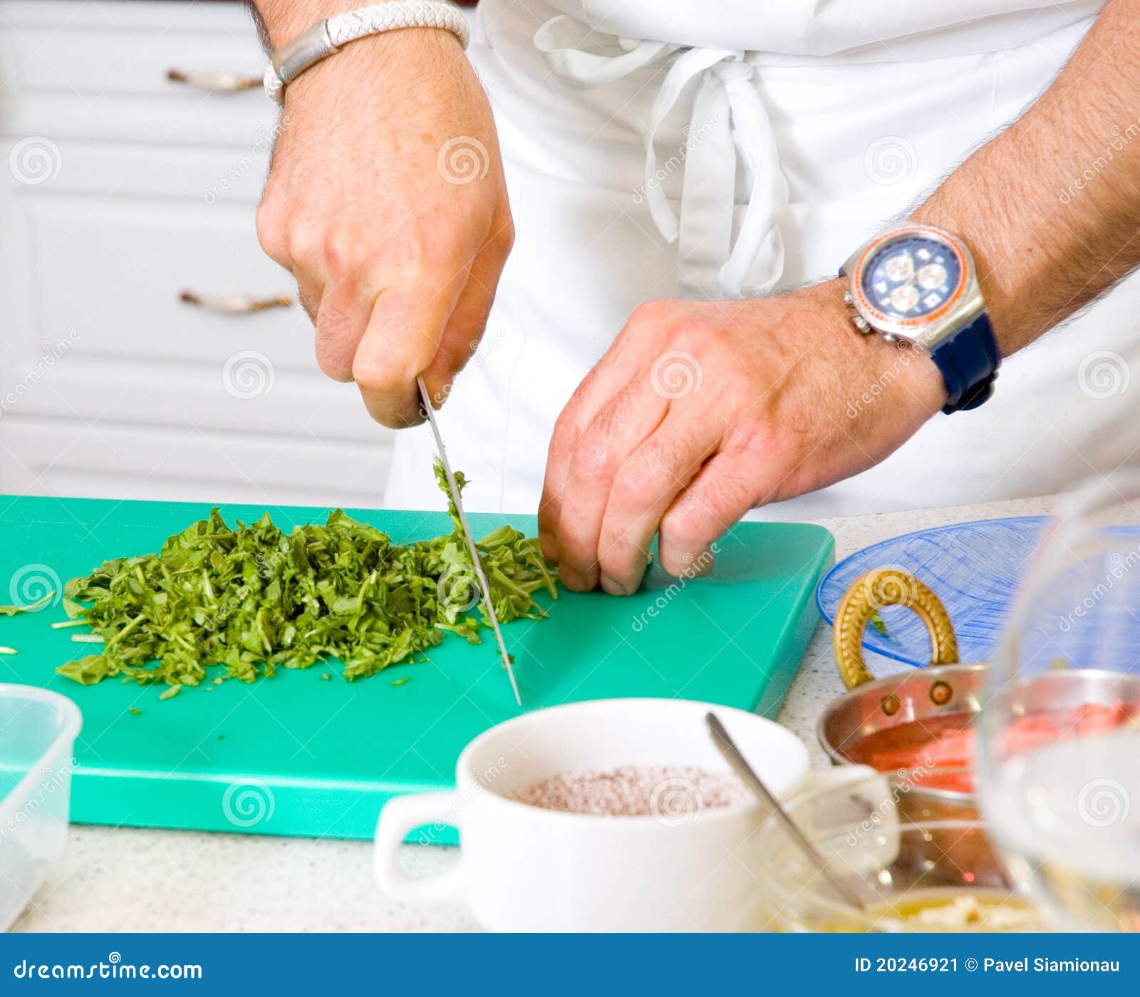 Chef cutting the parsley stock image. Image of cooking 20246921