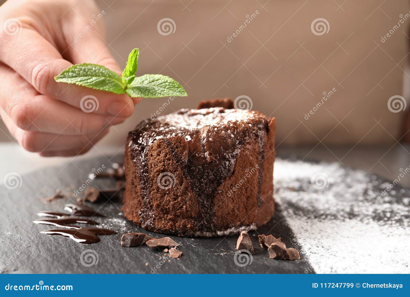Chef Decorating Delicious Fresh Chocolate Fondant Stock Image