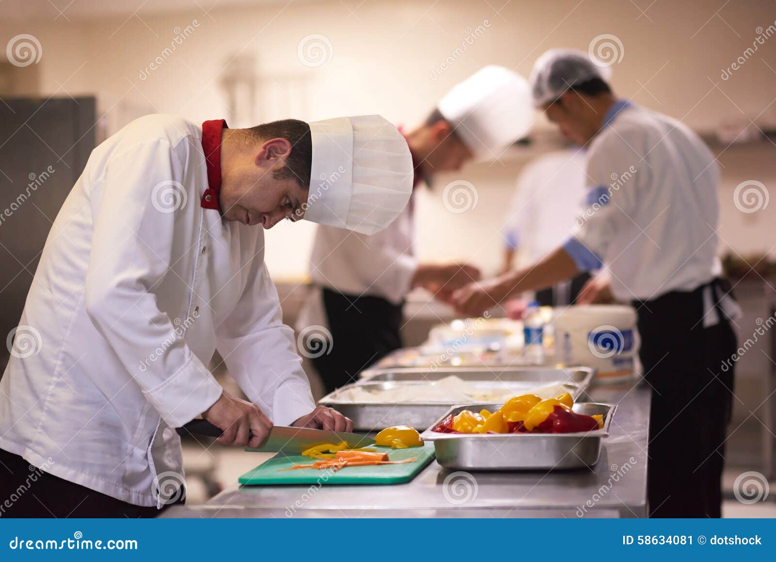 Chef in Hotel Kitchen Slice Vegetables with Knife Stock Image Image