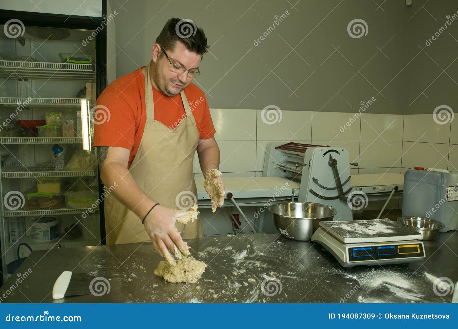 The Process of Making Bread. the Chef Kneads the Dough by Hand. the
