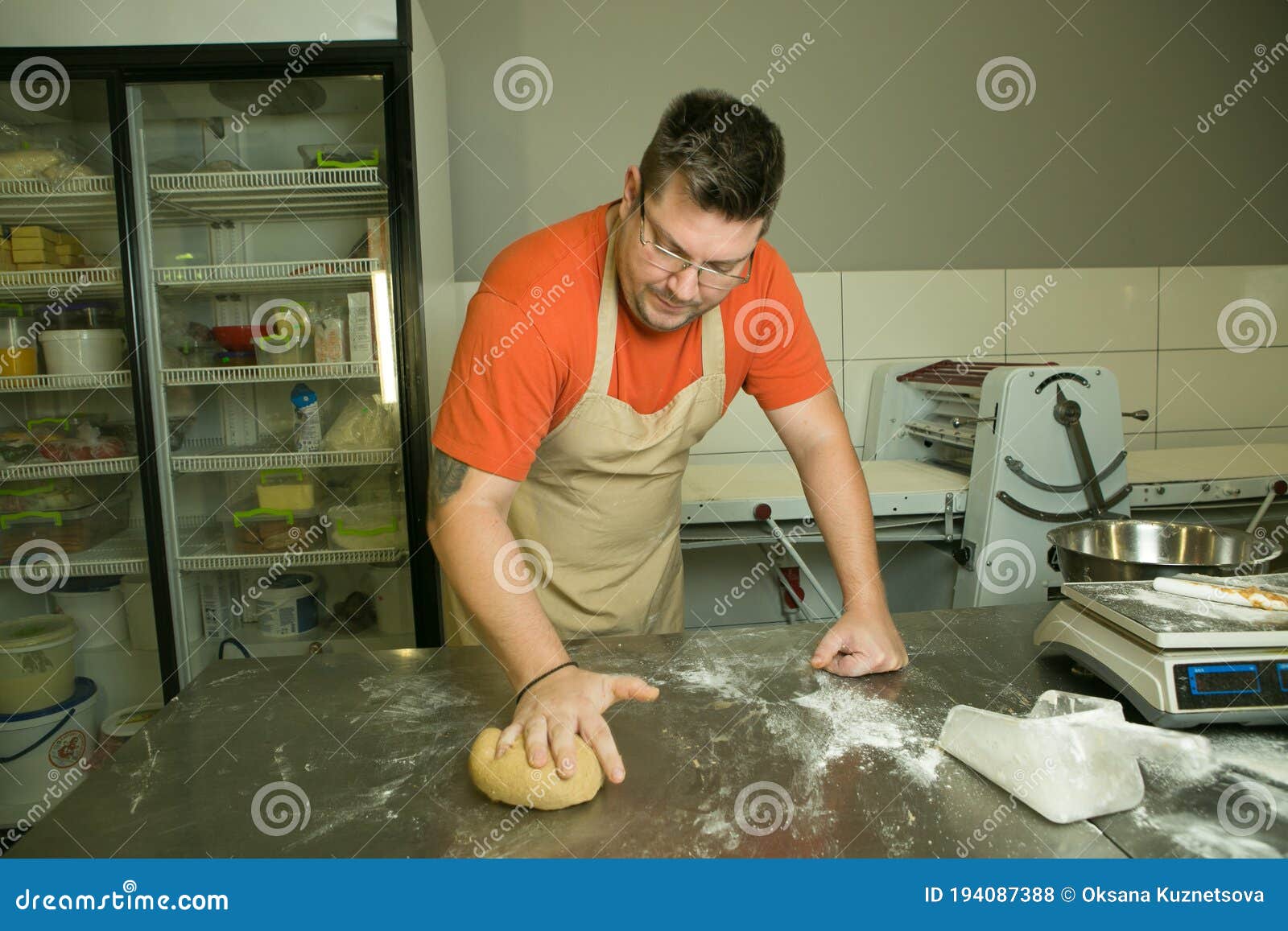 The Process of Making Bread. the Chef Kneads the Dough by Hand Stock