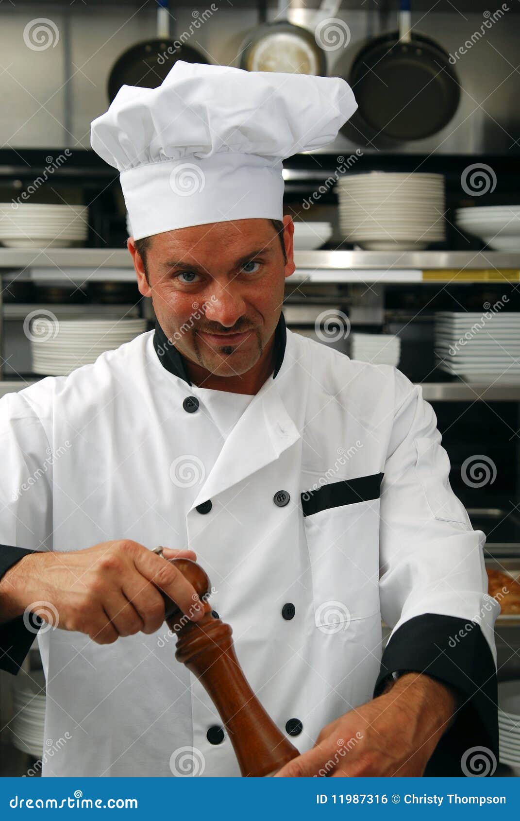 Chef with pepper grinder stock photo. Image of handsome 11987316