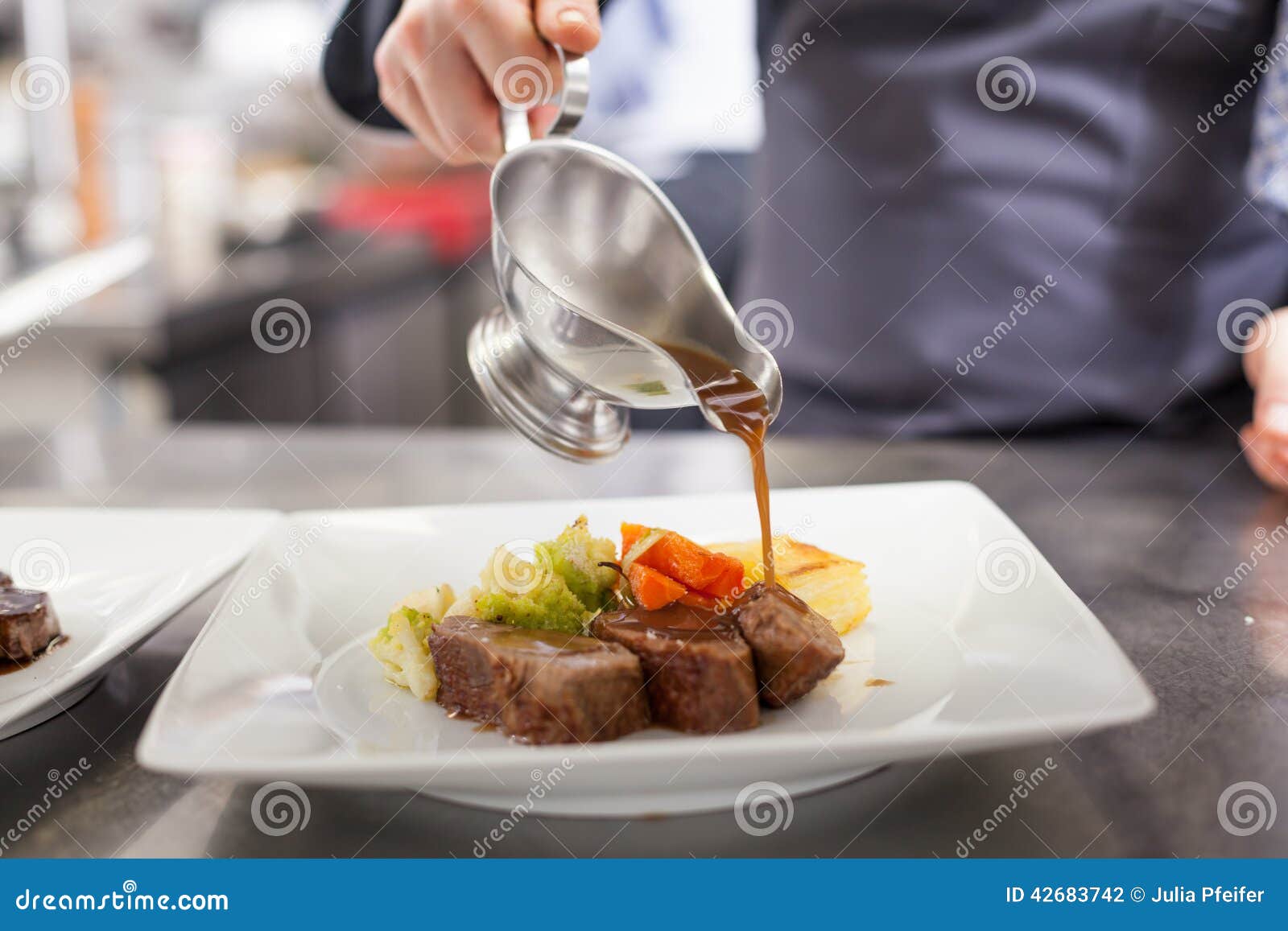 Chef Plating Up Food In A Restaurant Stock Photo - Image ...