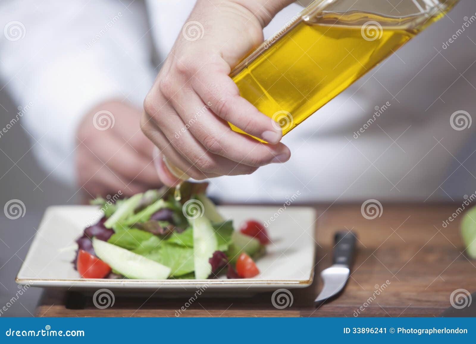 Chef Pouring Olive Oil Over Salad Stock Image Image Of Male People