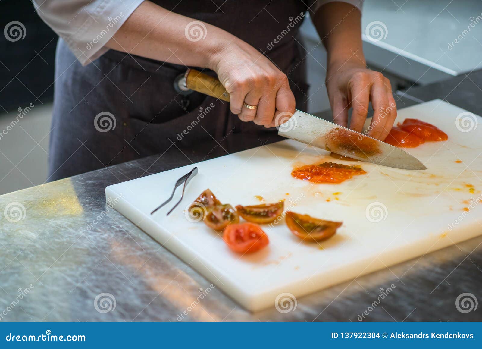 Cutting Tomatoes with a Kitchen Knife. Chef. a Restaurant. Stock Photo Image of japan, healthy
