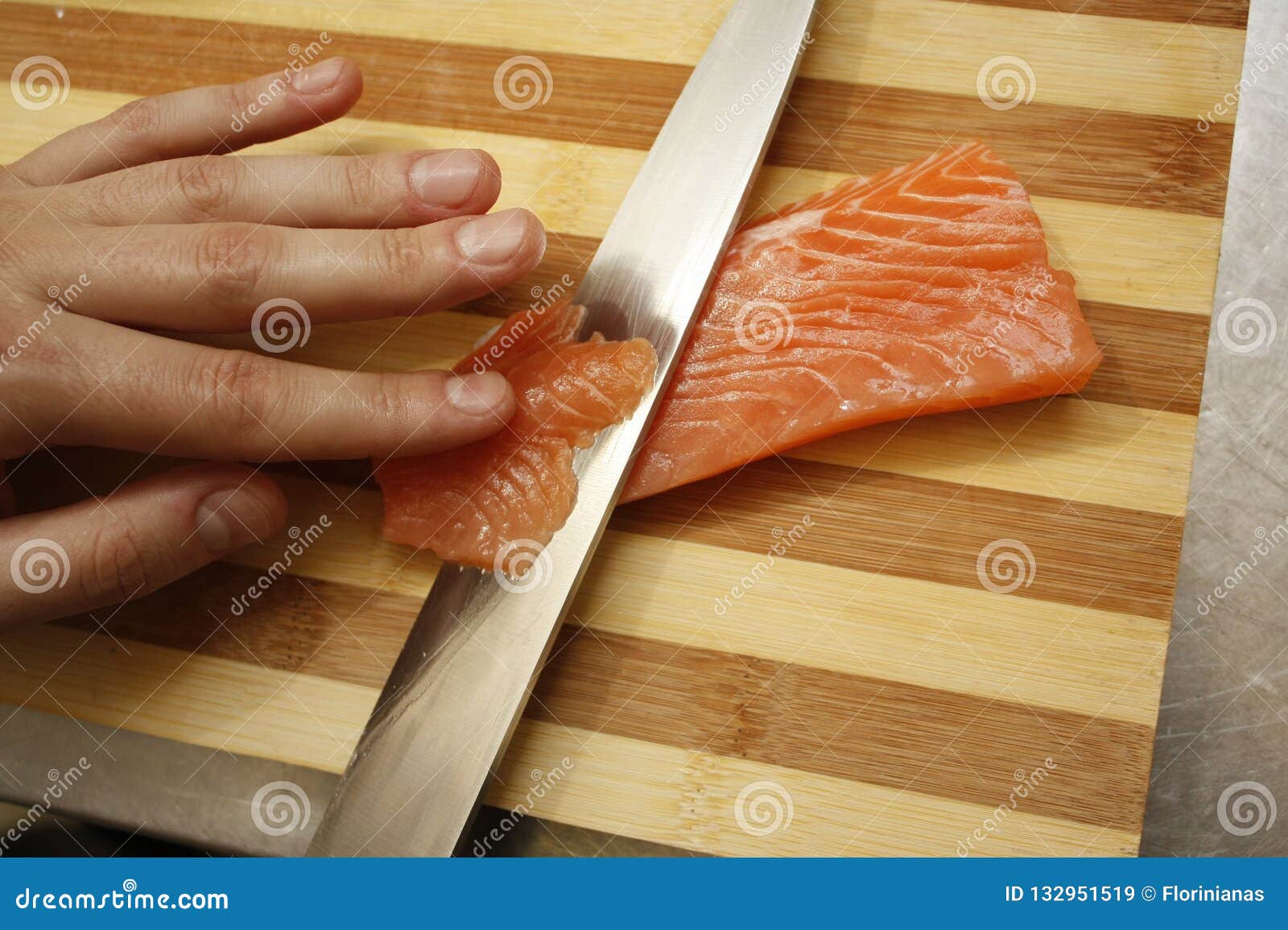 Chef`s Hand Cutting Fish into Thin Slices with a Knife Stock Image - Image  of restaurant, fresh: 132951519