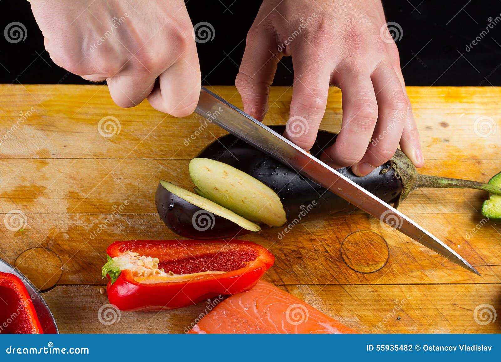 Chef is slicing eggplant stock photo. Image of wood, chopping 55935482