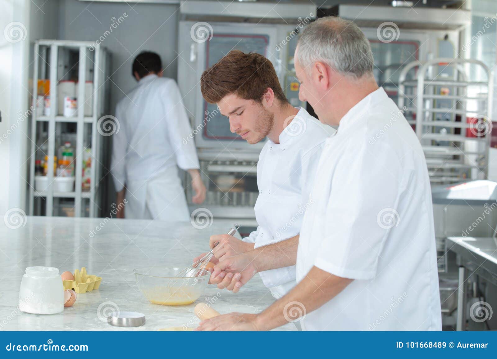 Chef Teaching Trainee How To Pastry Chef Stock Image Image of