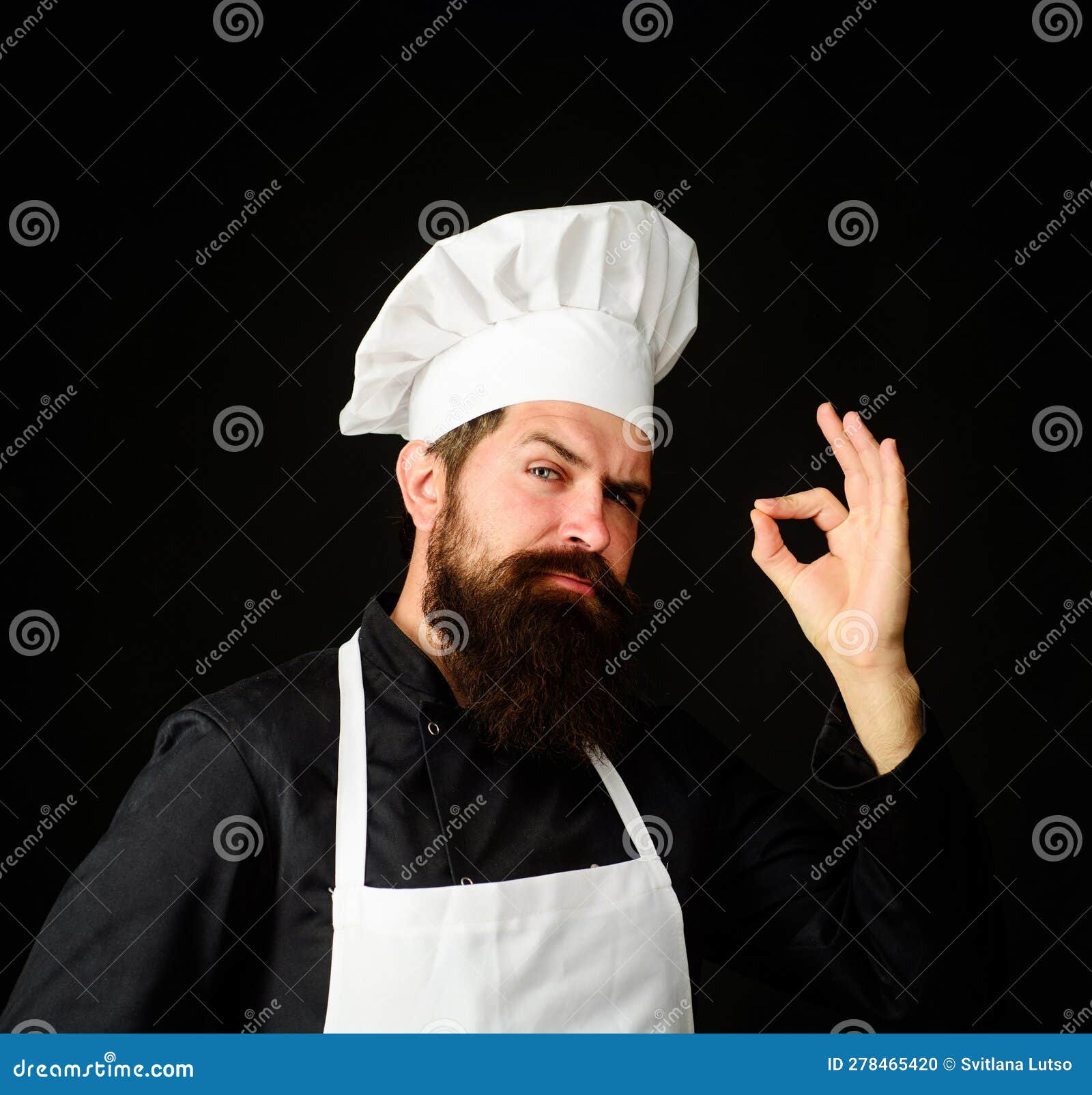 Bearded man cook wear chef hat and uniform. Male chef, cook, baker in  uniform holds saucepan