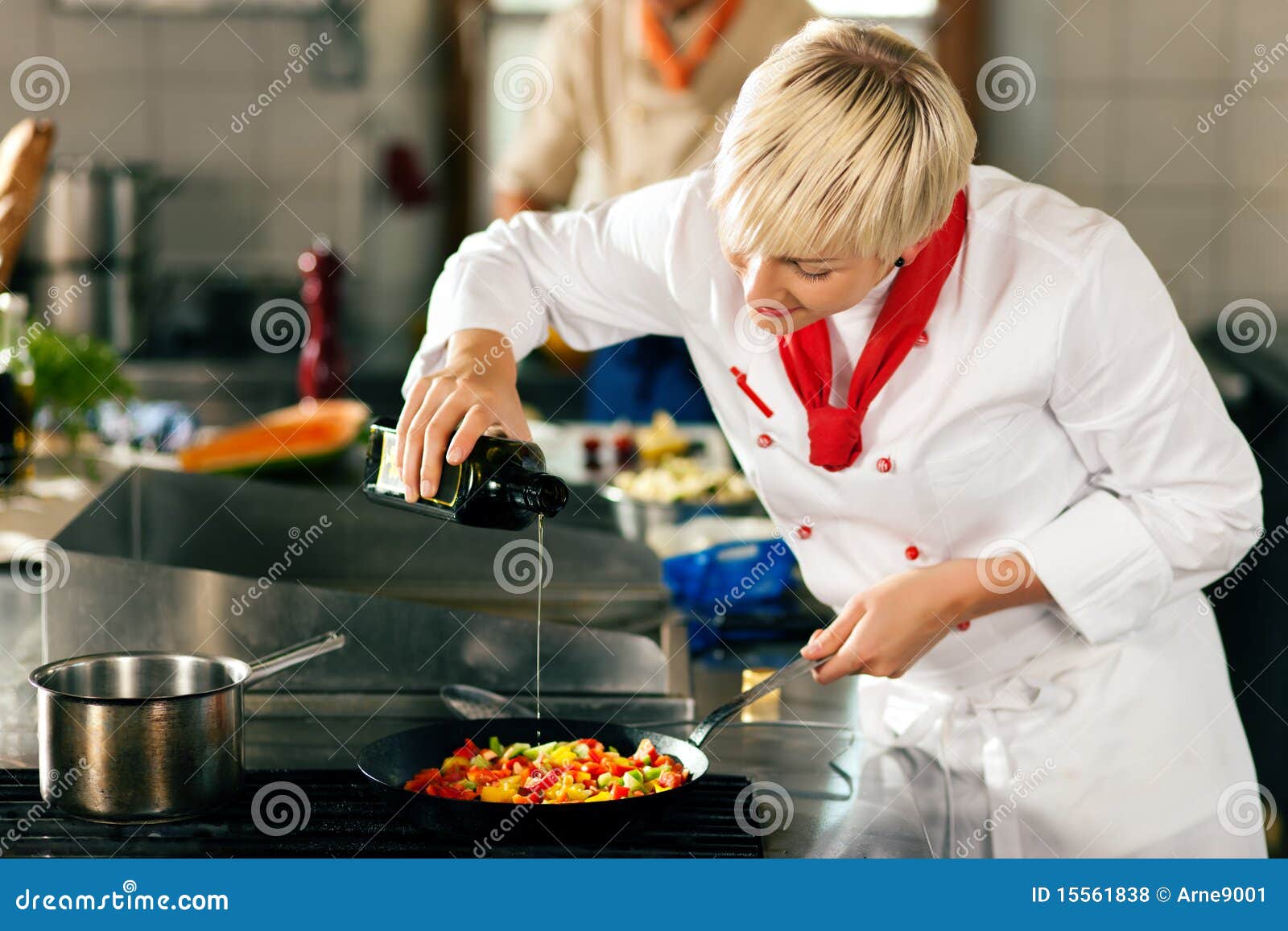 chefs in a restaurant or hotel kitchen cooking