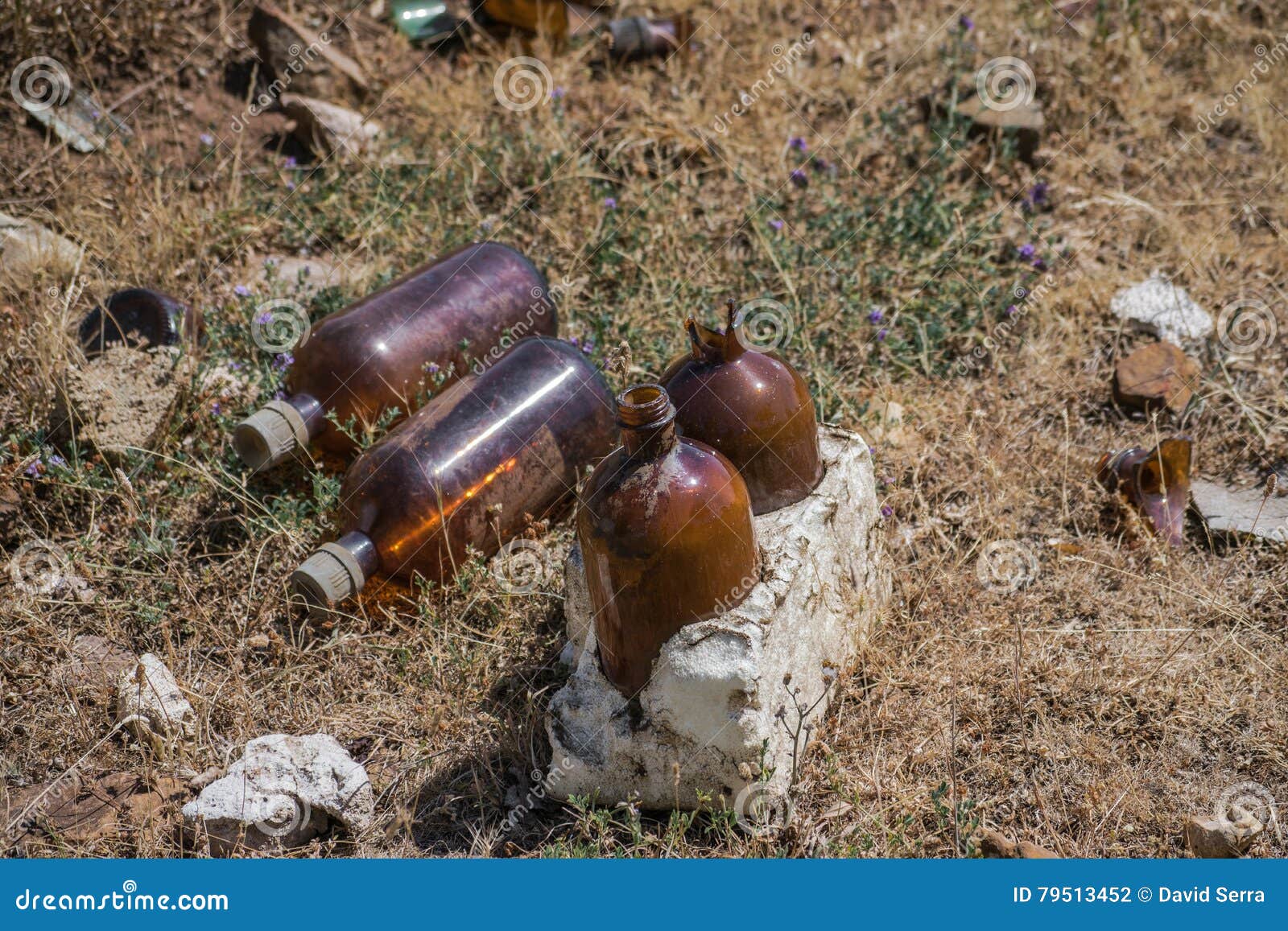 chemical bottles littering the mount