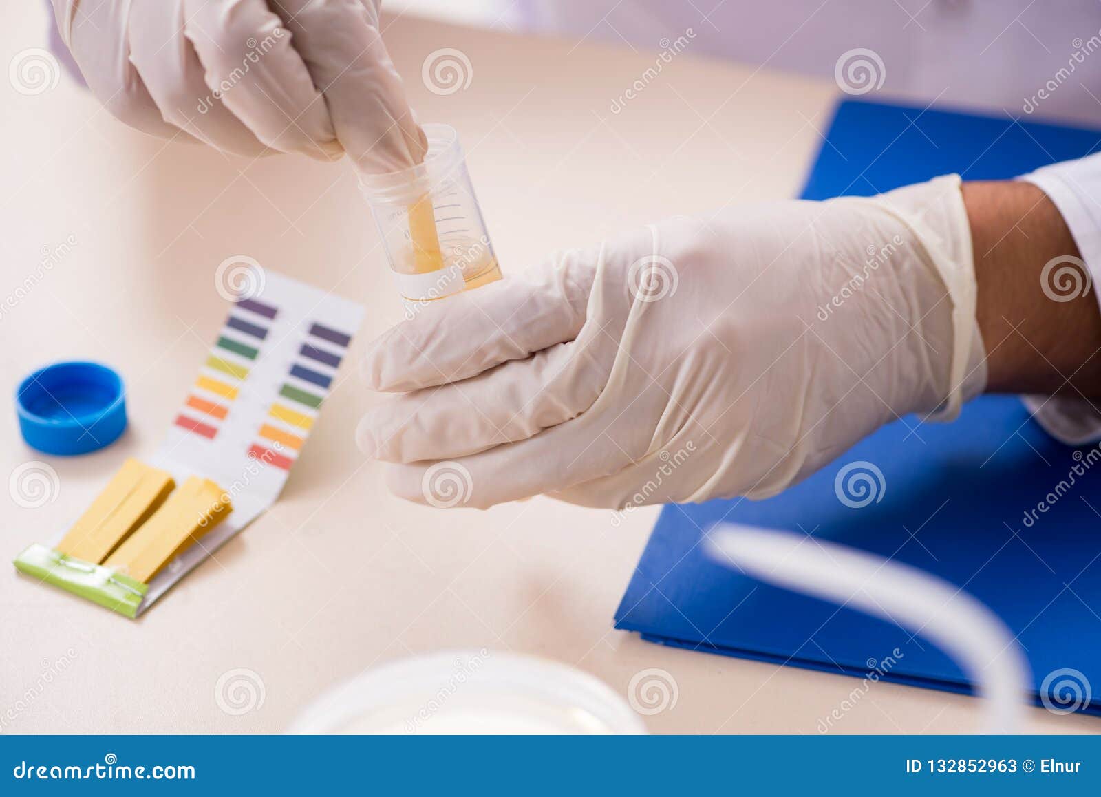 The Chemist in the Lab Checking with Ph Strips Stock Image Image of