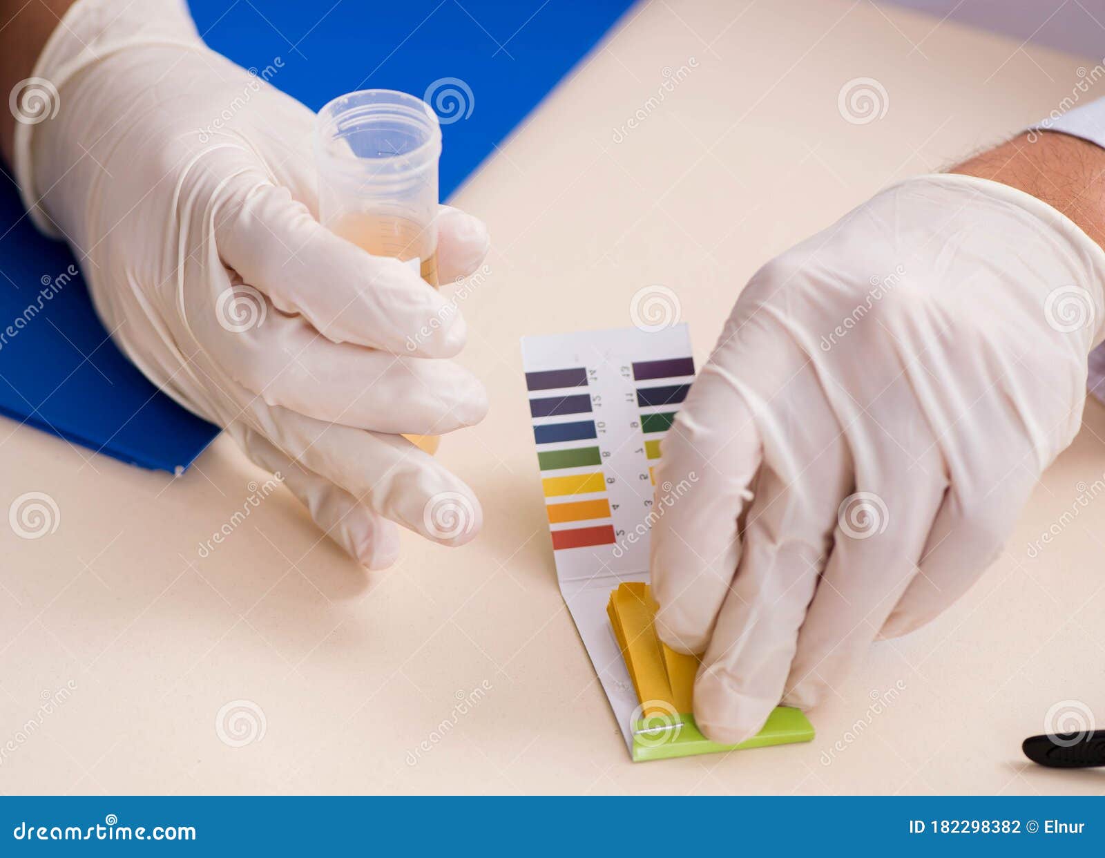 Chemist in the Lab Checking with Ph Strips Stock Photo Image of
