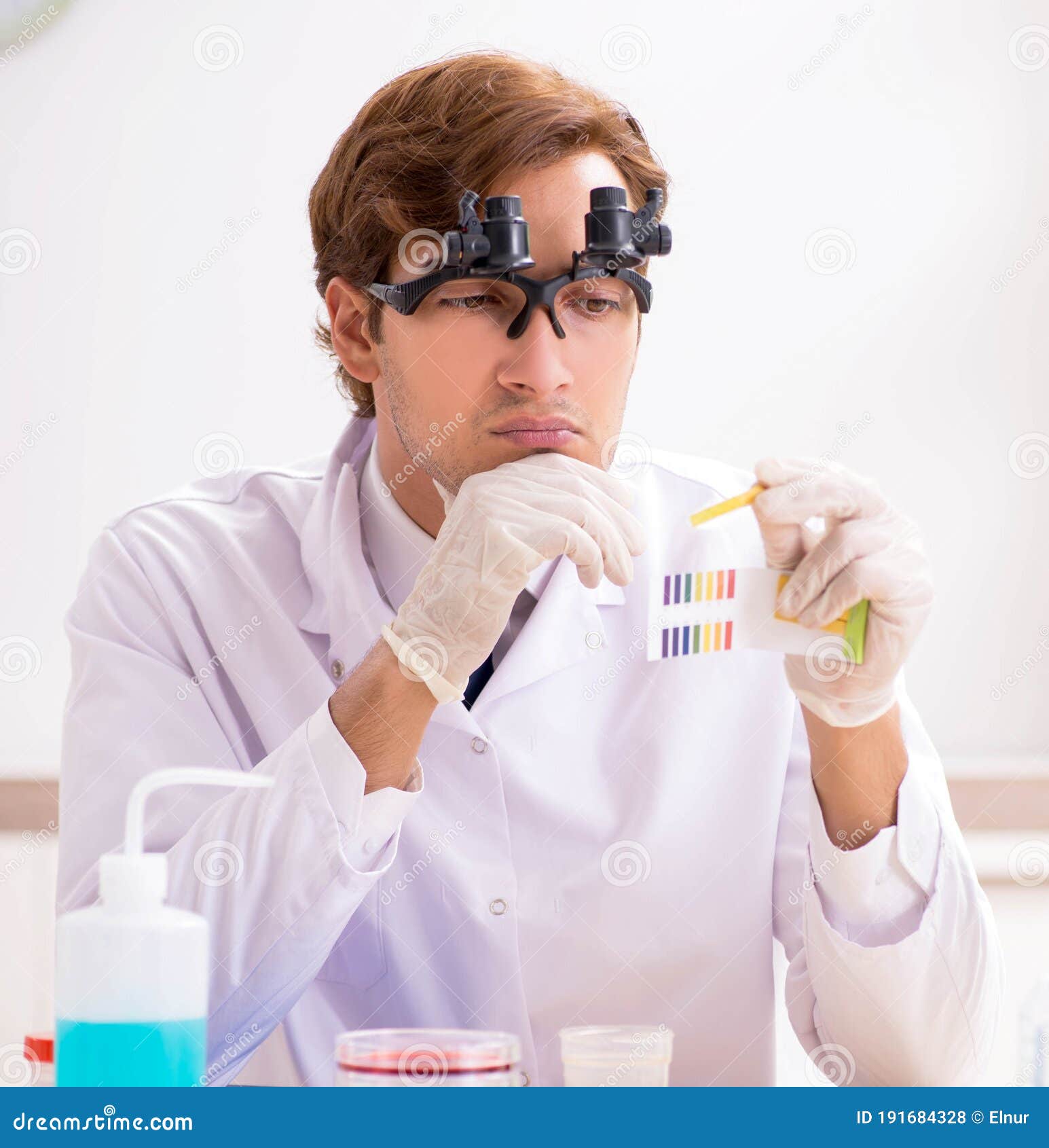 Chemist in the Lab Checking with Ph Strips Stock Photo Image of