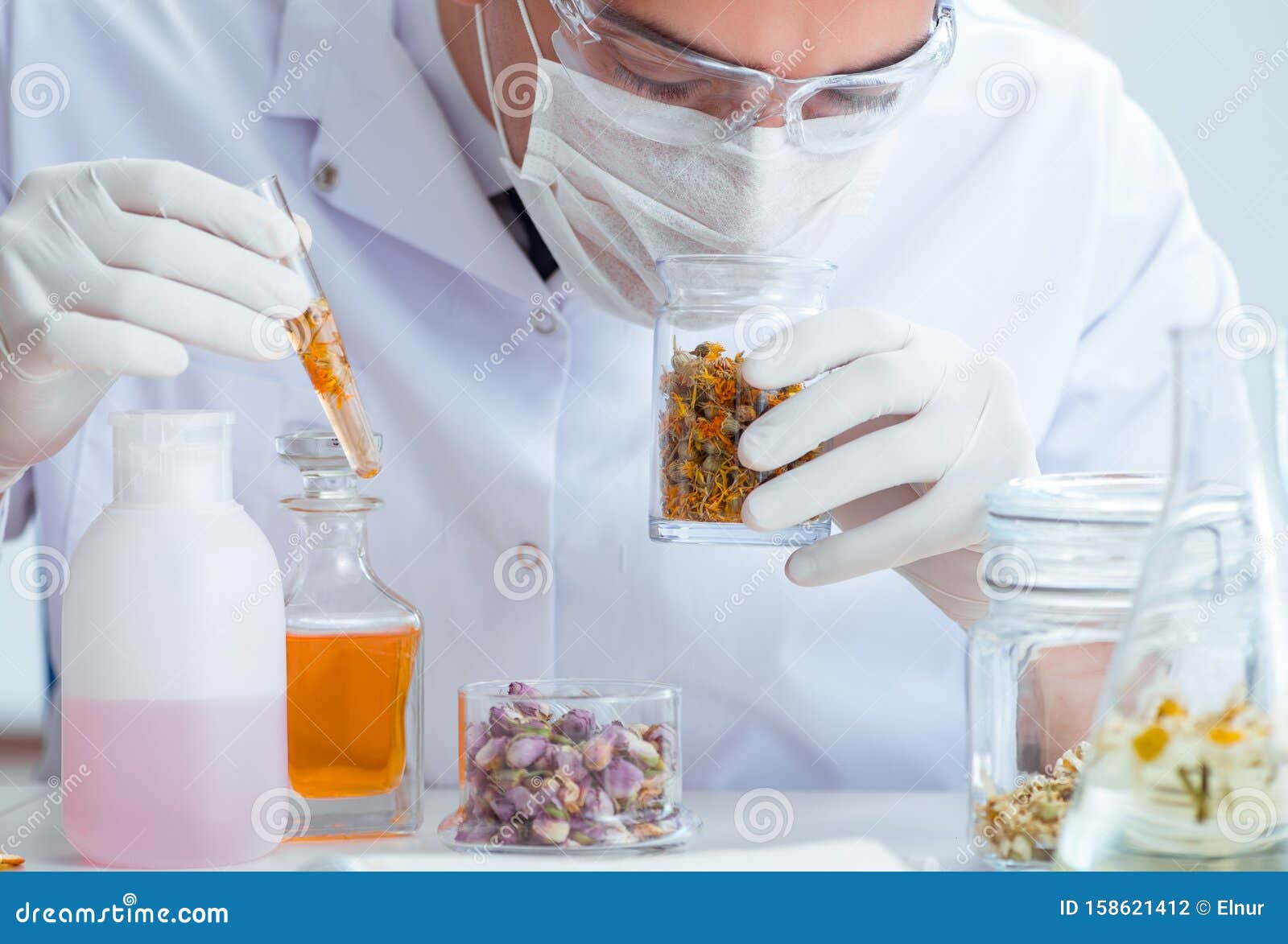 Chemist Mixing Perfumes in the Lab Stock Photo Image of natural, bottle 158621412