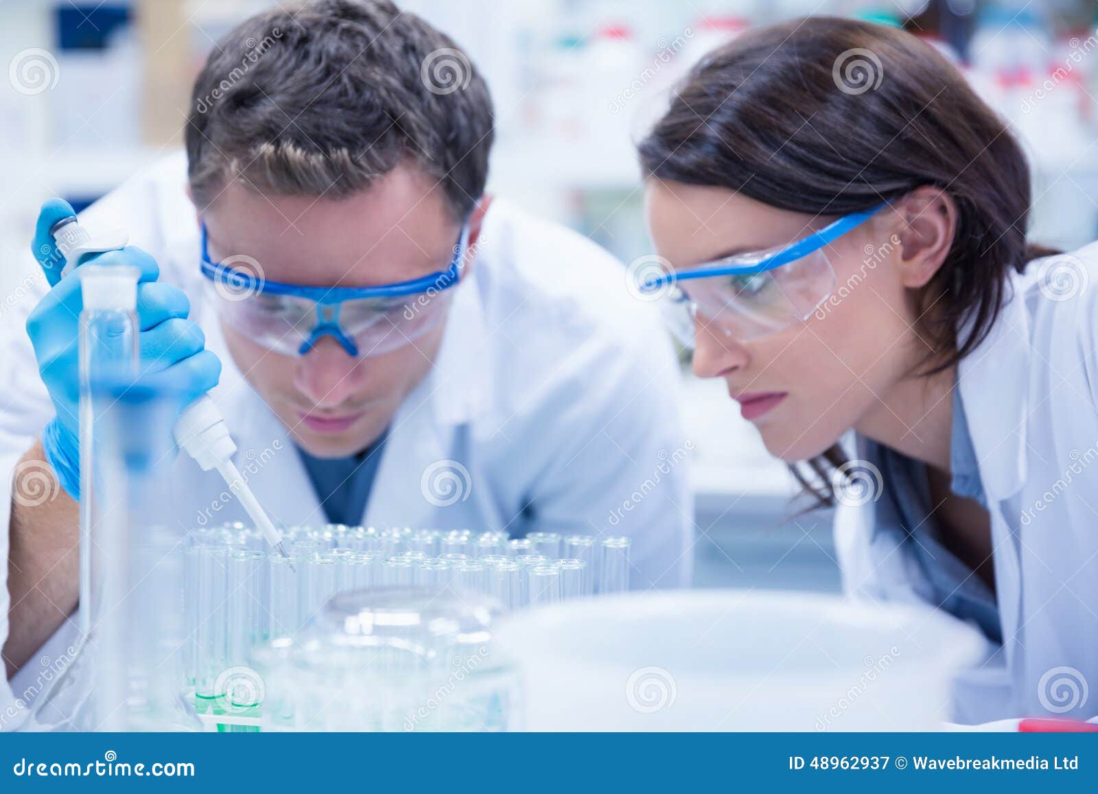 Chemist Team Working with Pipette and Test Tube Stock Image Image of