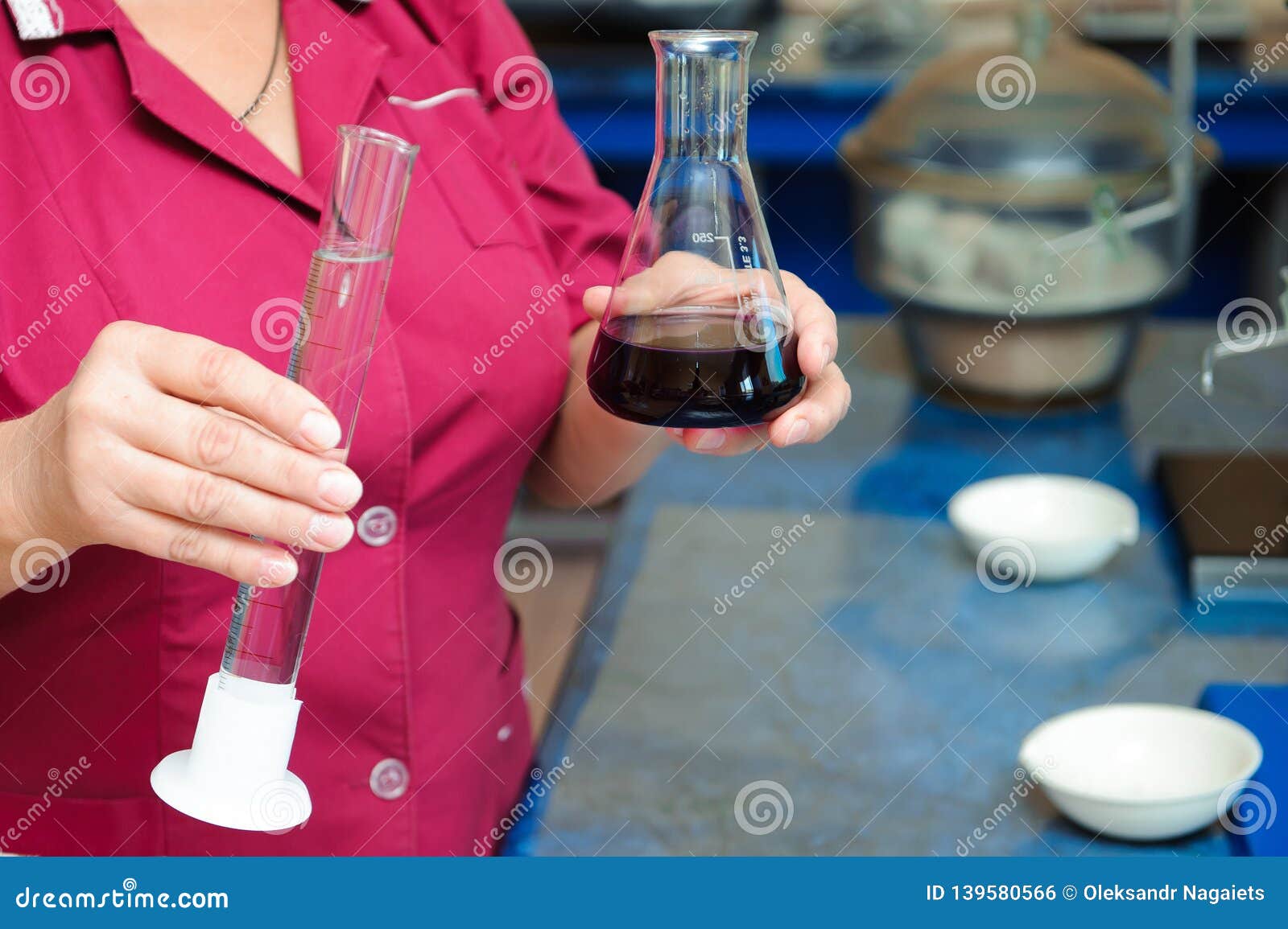 Chemist Testing Production in a Factory, Engineering Stock Photo