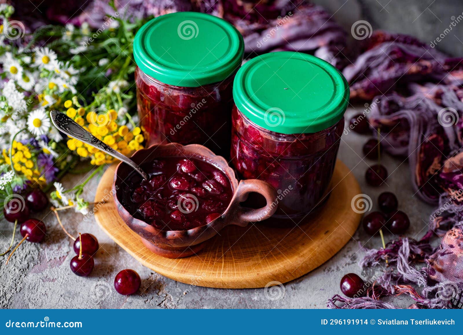 Cherry Jam in a Glass Jar. Closeup Stock Photo Image of table