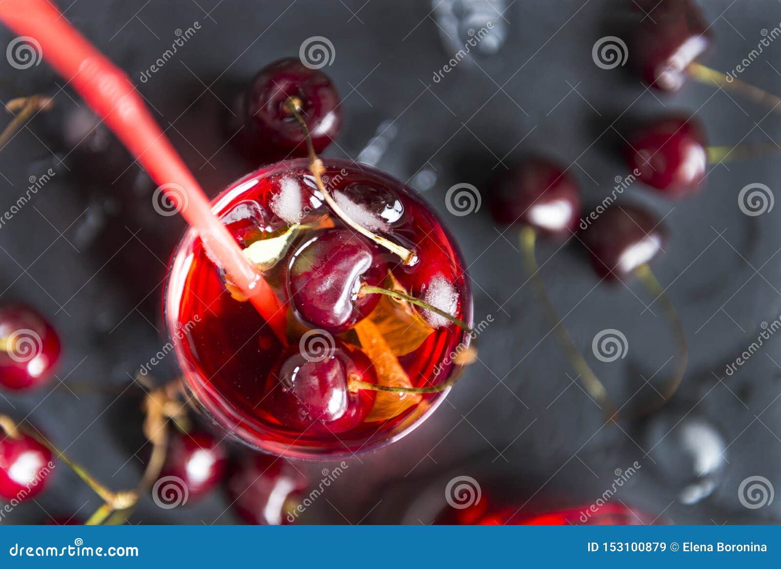 cherry, limonada glass of cherry on a black background, berries