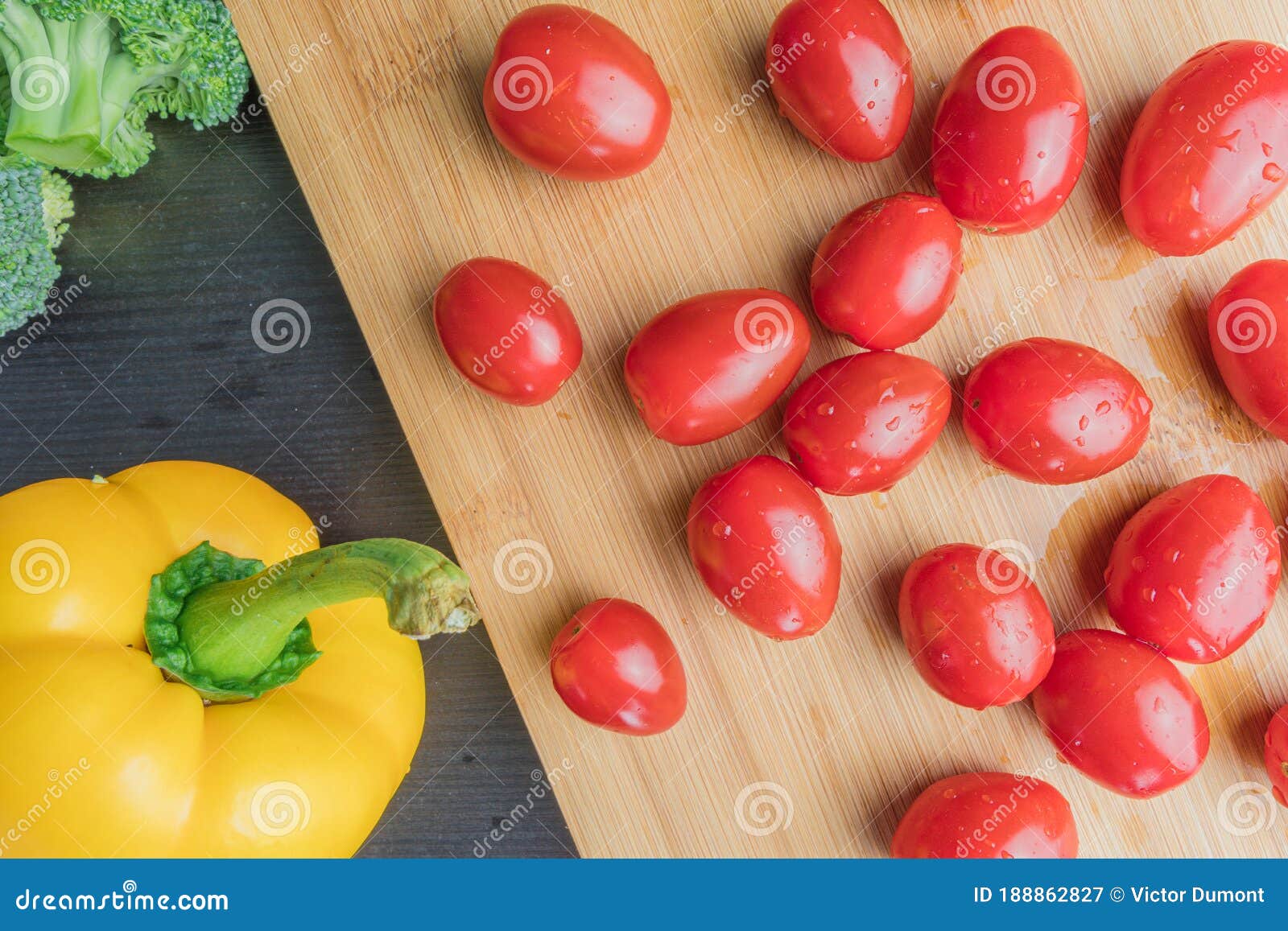 cherry tomatoes on a cutting board