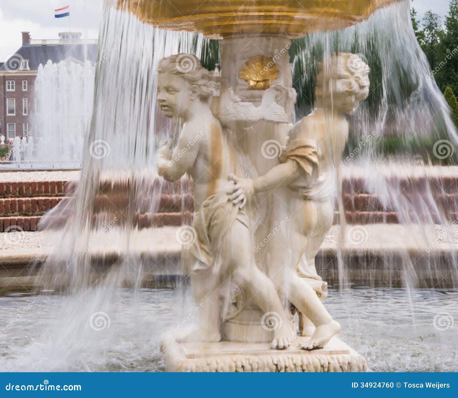 Cherub Fountain with Blurred Water Flowing Stock Photo Image of