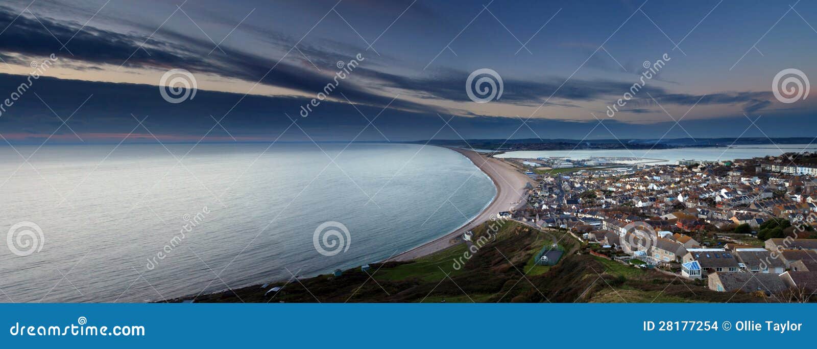 Chesil beach at sunset stock photo. Image of roof, buildings 28177254