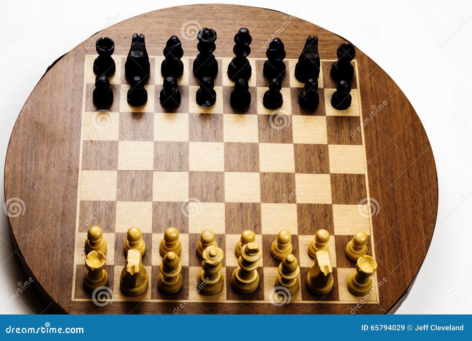 Wooden chess board with starting position