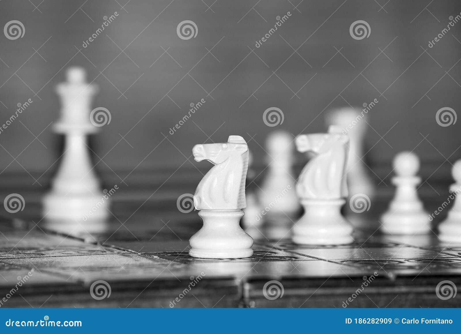 Chess photographed on a chessboard. Chess photographed with neutral backdrop