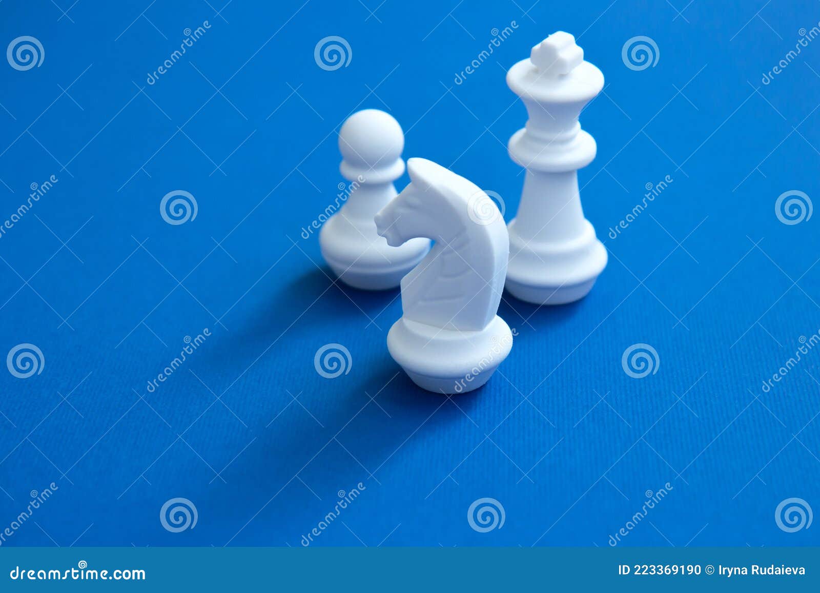Chess Pieces on a Bright Blue Background. Abstract Background Stock