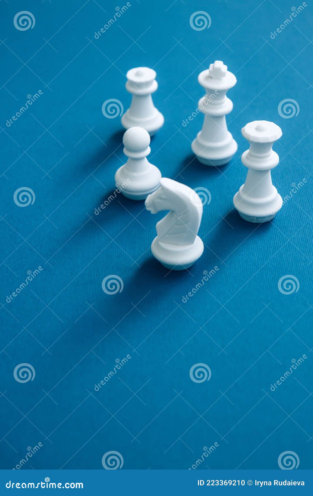 Chess Pieces on a Bright Blue Background. Abstract Background Stock