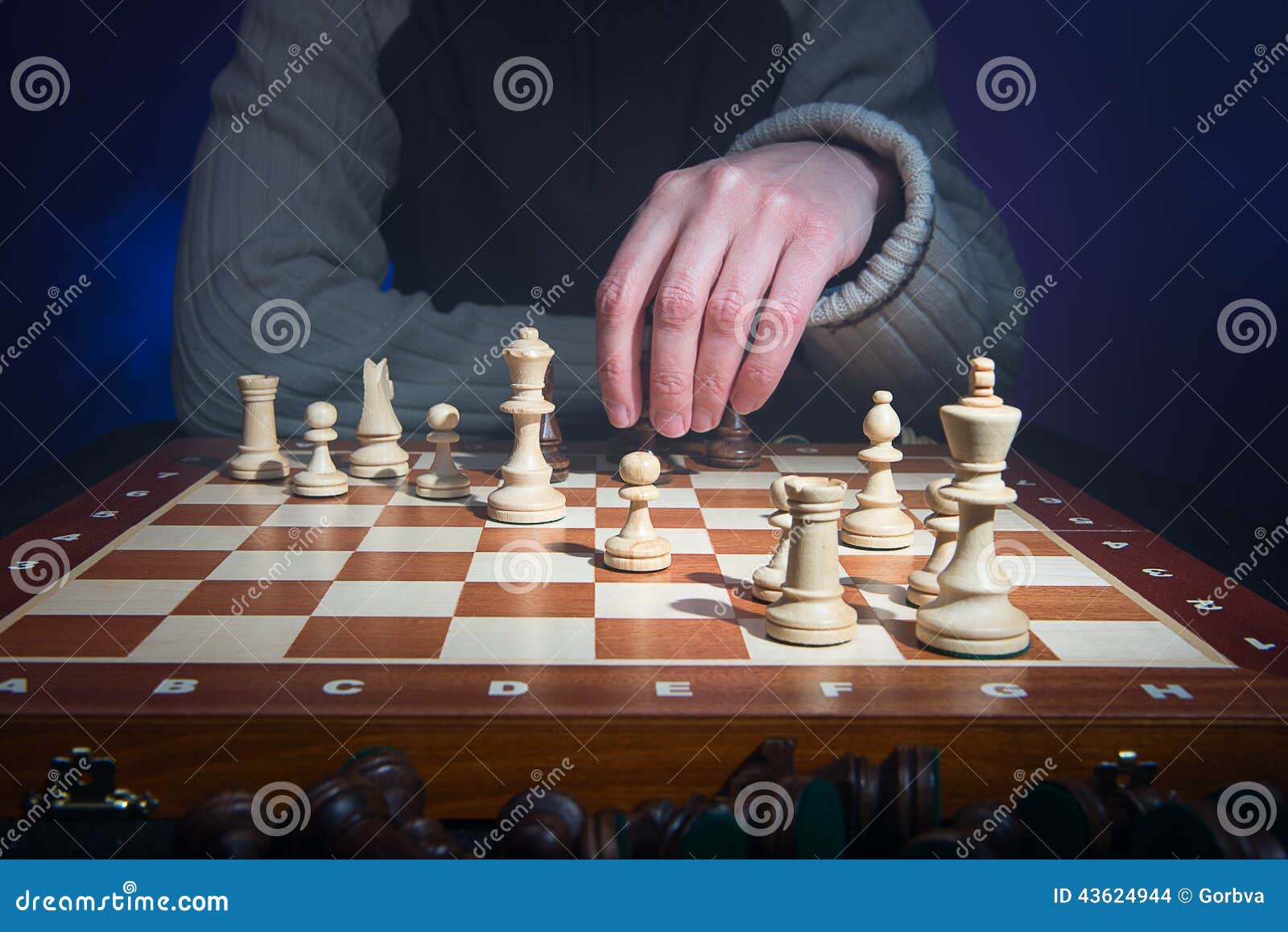 A chess player making his next chess move Stock Photo - Alamy