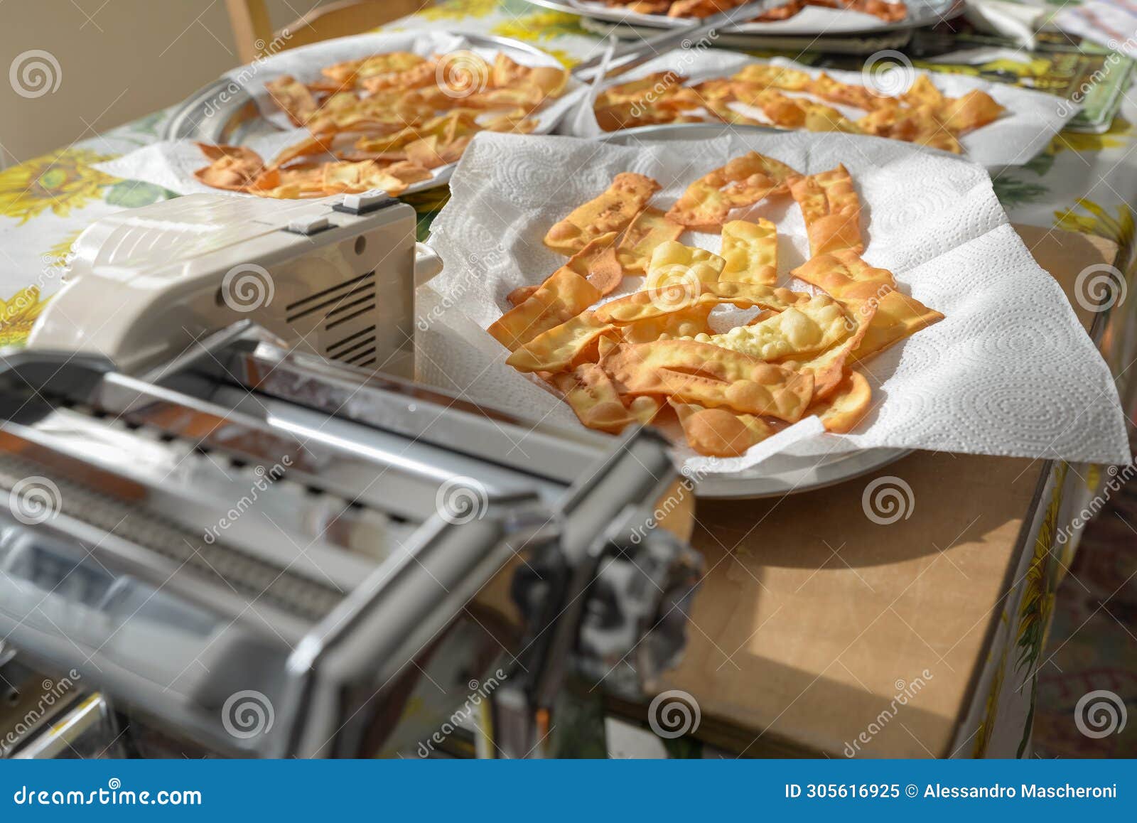 chiacchiere, italian sweet dessert deep fried to which icing sugar is added