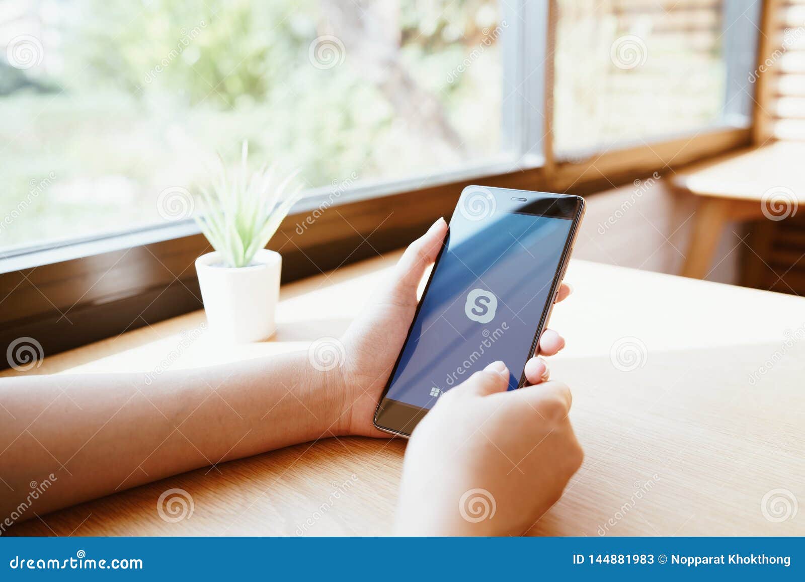 CHIANG MAI, THAILAND - JAN. 19,2019: Woman Holding HUAWEI With Skype Apps. Skype Is Part Of ...