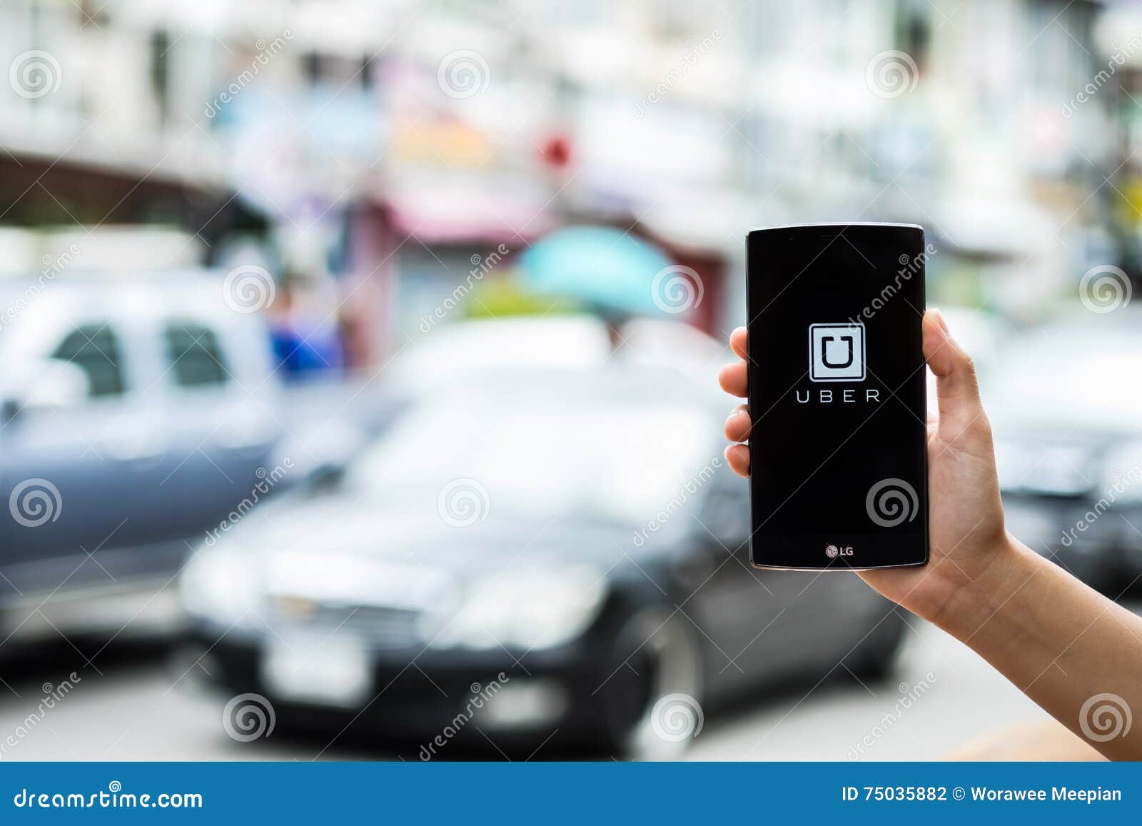 CHIANG MAI,THAILAND - JULY 17, 2016 : a Man Hand Holding Uber App ...