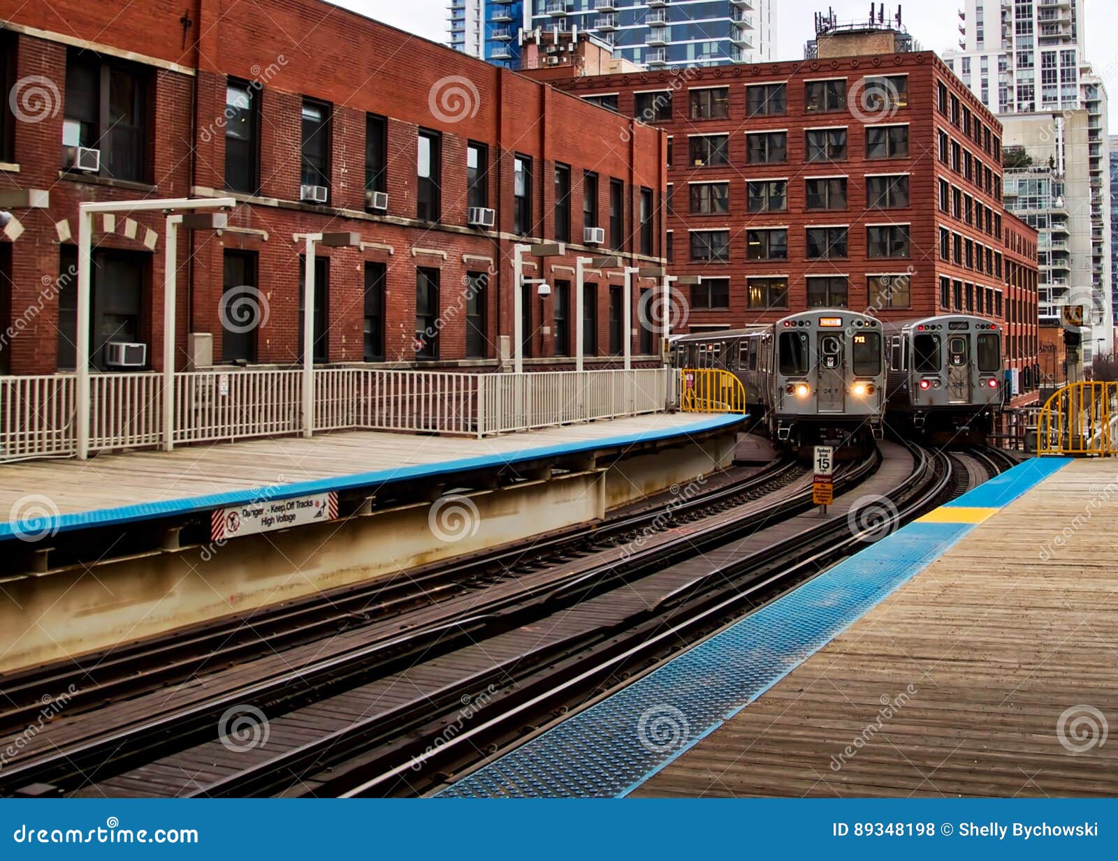 Two of Chicago S Elevated El Trains, Approaching and Leaving the