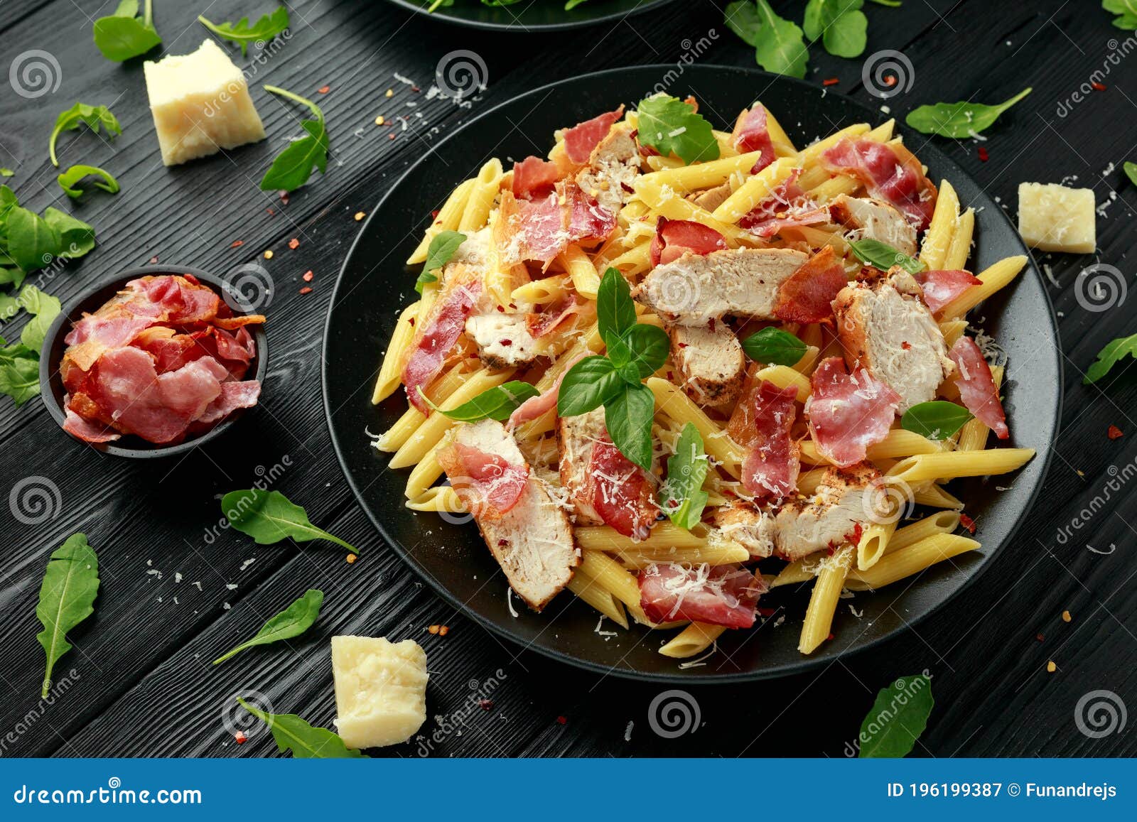Chicken, Bacon Penne Pasta with Parmesan Cheese and Basil. Healthy Food