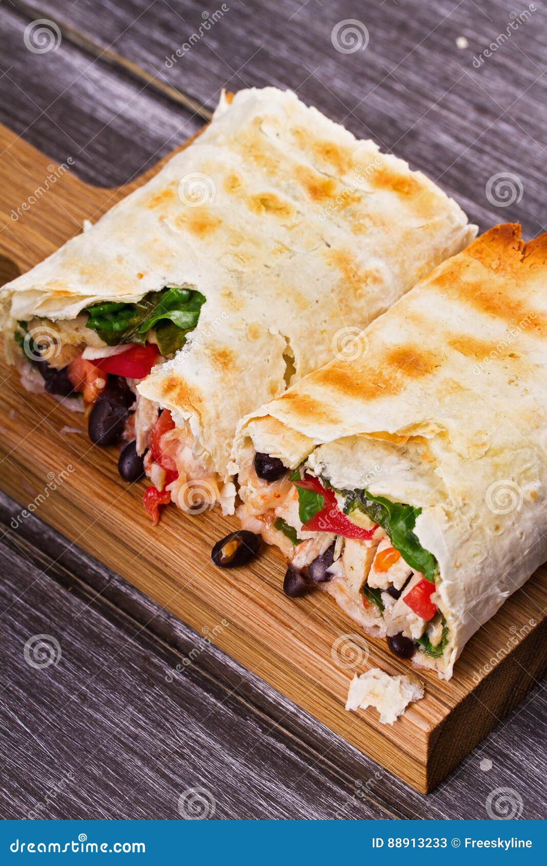 Chicken, Black Beans, Spinach and Tomato Burritos. Stock Image Image