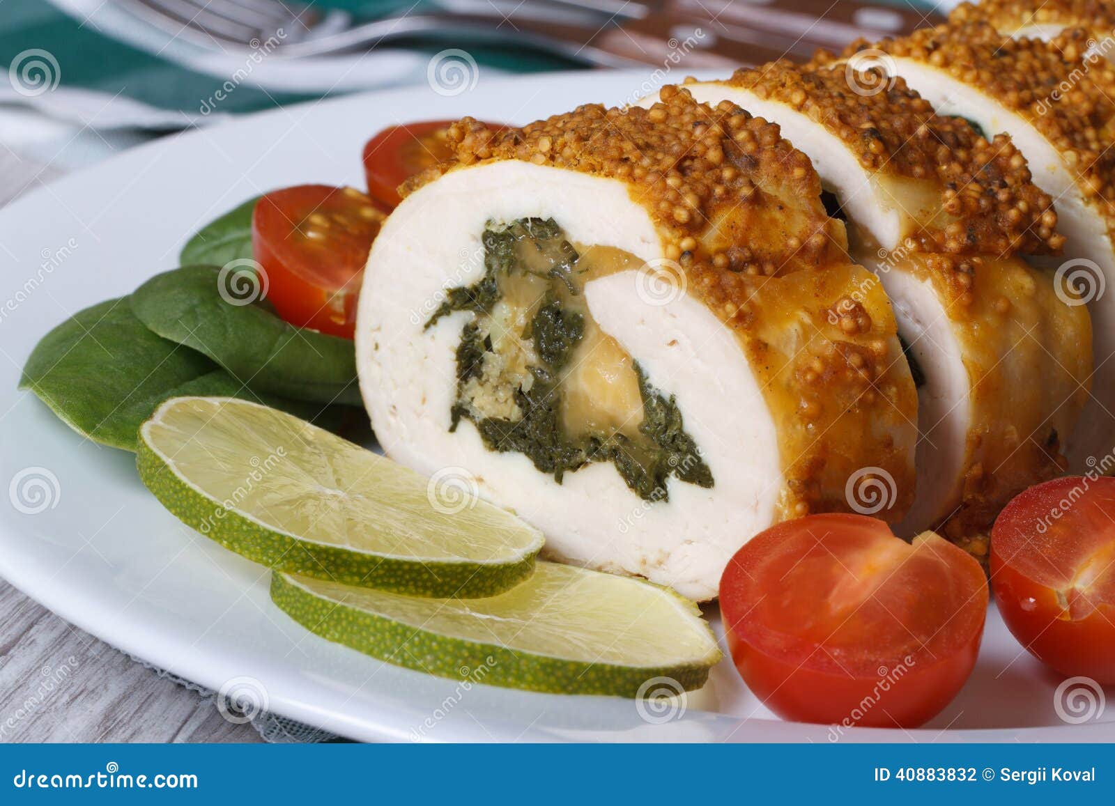Chicken Breast Filled with Spinach and Cheese and Fresh Tomatoes Stock