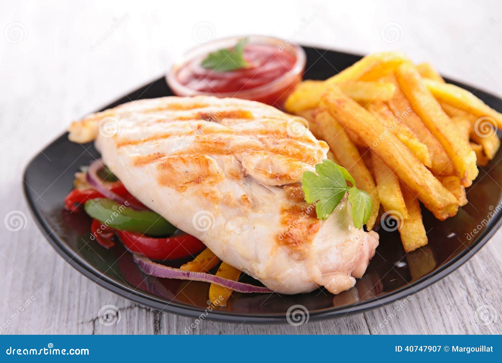 Chicken breast and fries stock image. Image of grilled 40747907
