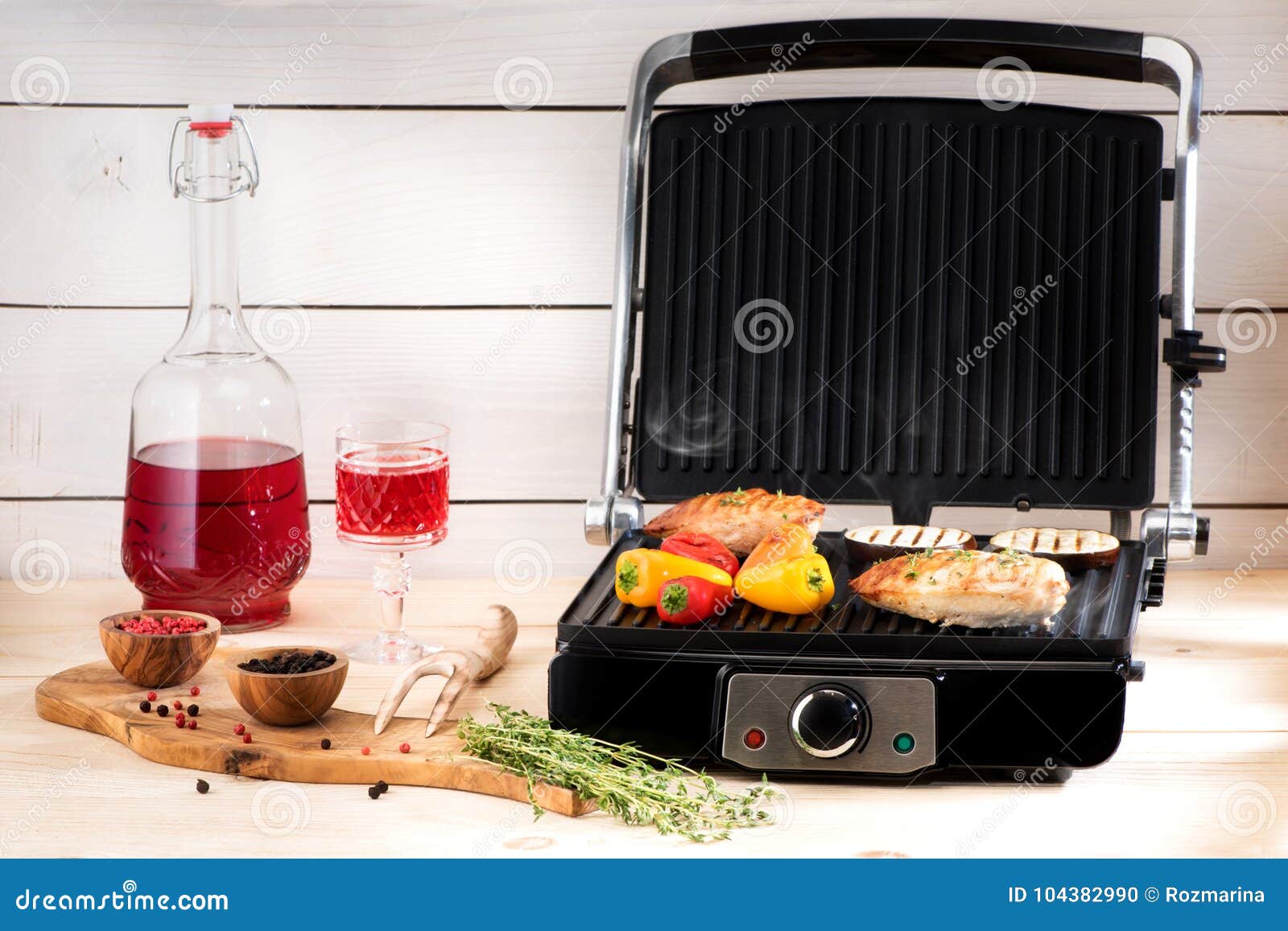 Preparation of Chicken Breasts and Vegetables on an Electric Grill