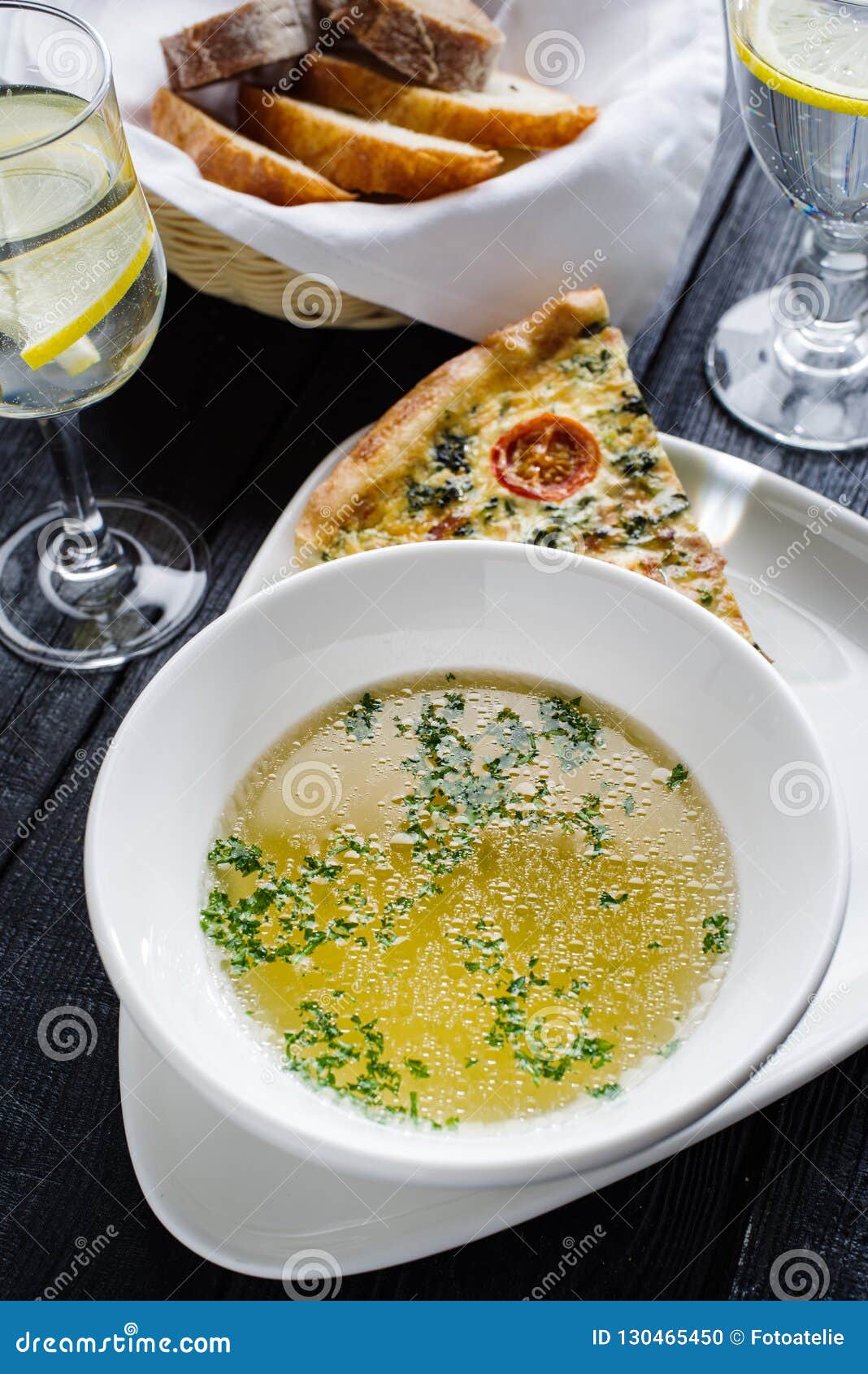 Chicken Broth with Kish Loren with Spinach and Ham. Stock Photo Image