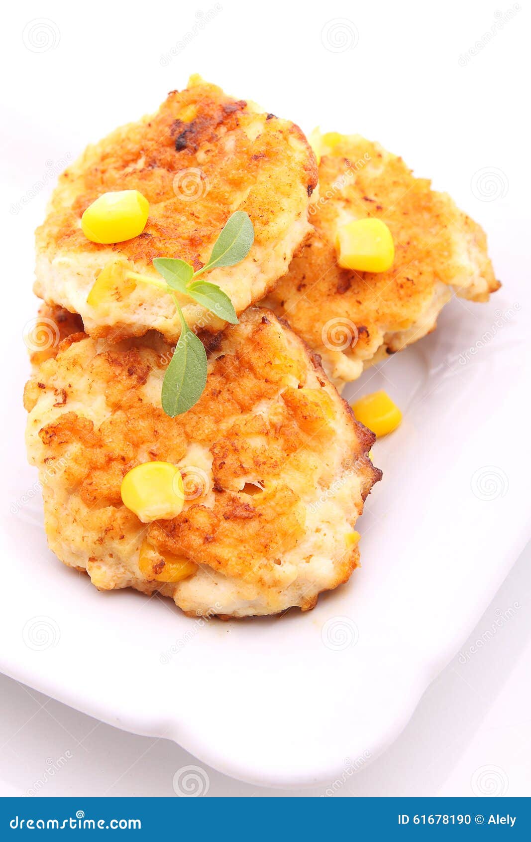 Chicken cutlets with corn stock photo. Image of group 61678190