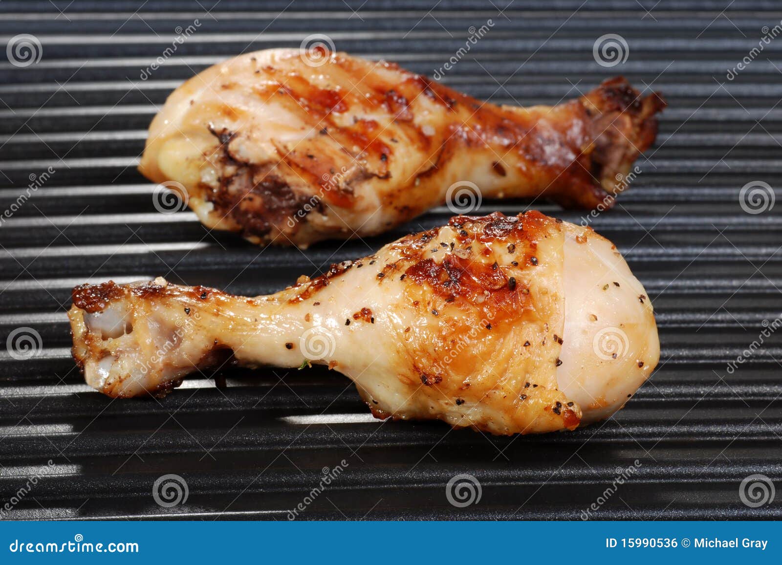 Chicken drumstick on grill stock photo. Image of organic 15990536