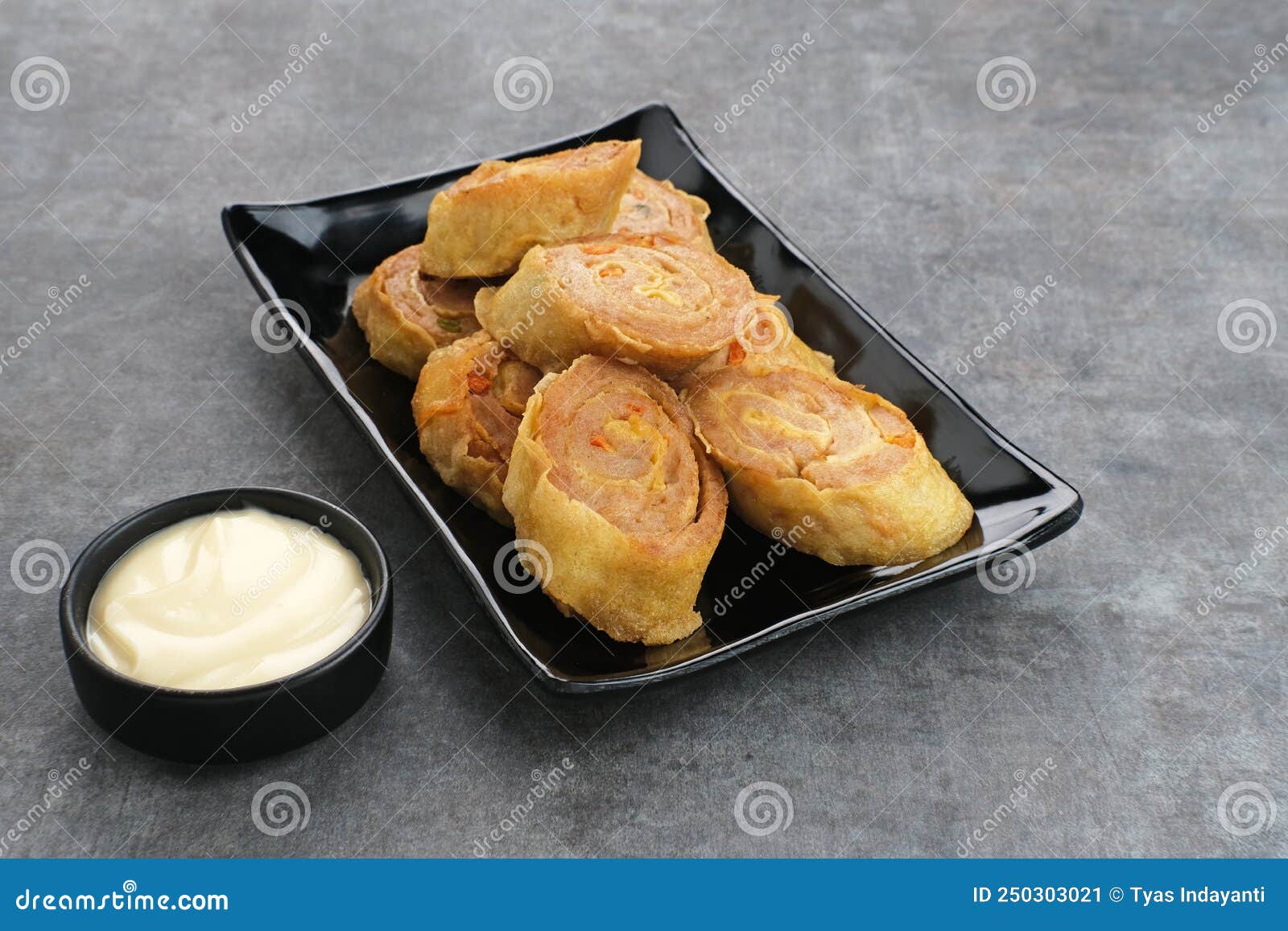 chicken egg rolls, made from mixtured minced chicken with tapioca, carrots, scallions and eggs