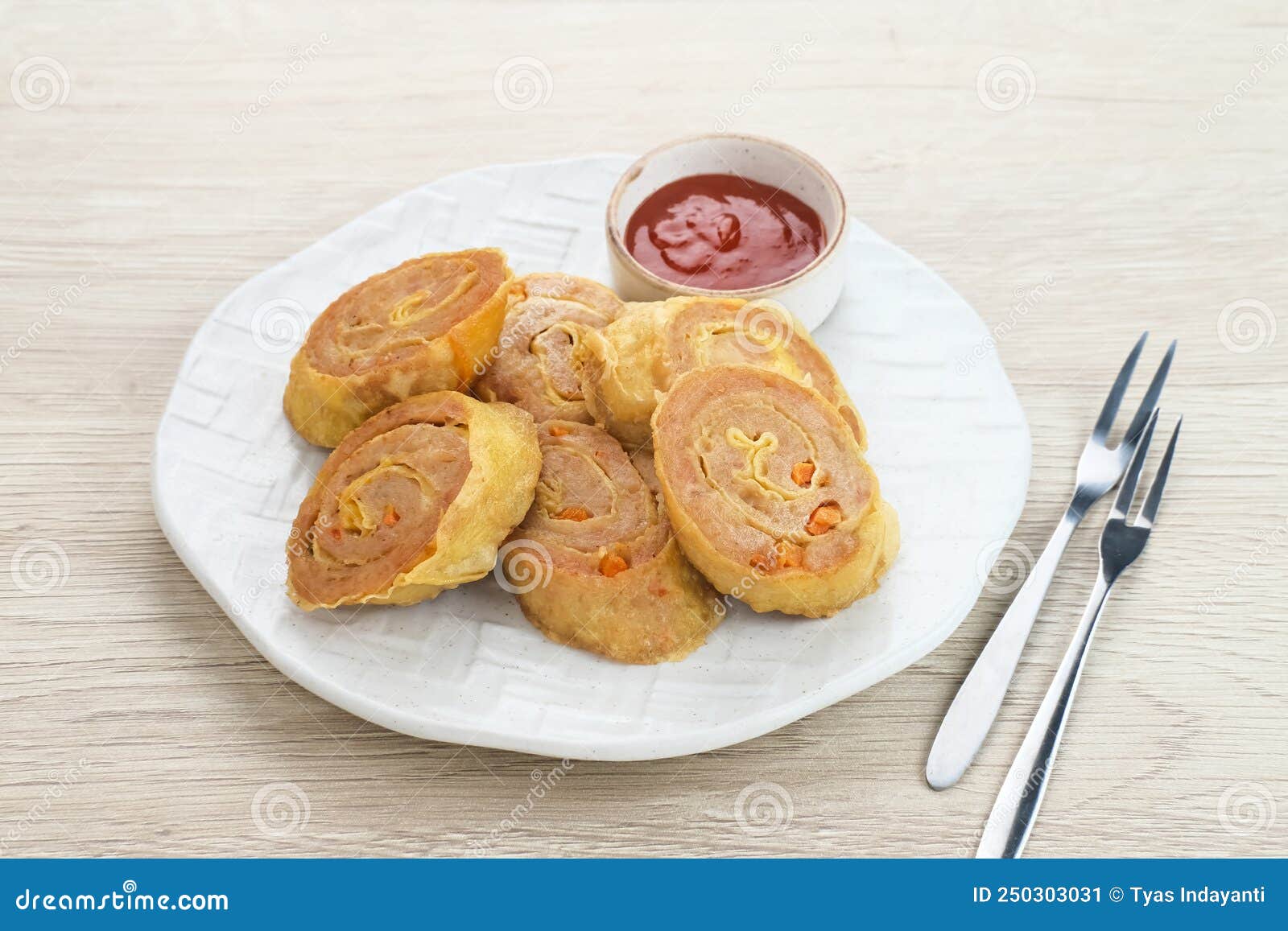 chicken egg rolls, made from mixtured minced chicken with tapioca, carrots, scallions and eggs