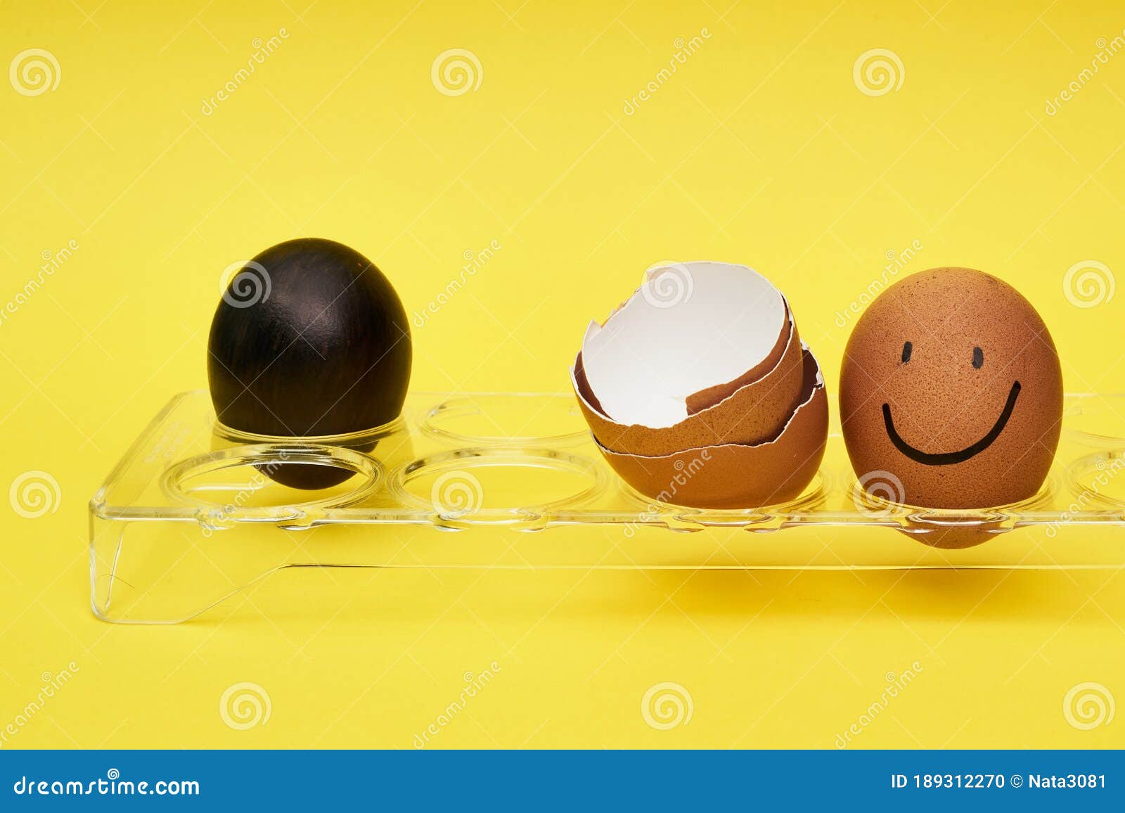 Chicken Eggs in an Egg Holder. Full Tray of Eggs. Half an Egg, Egg Yolk