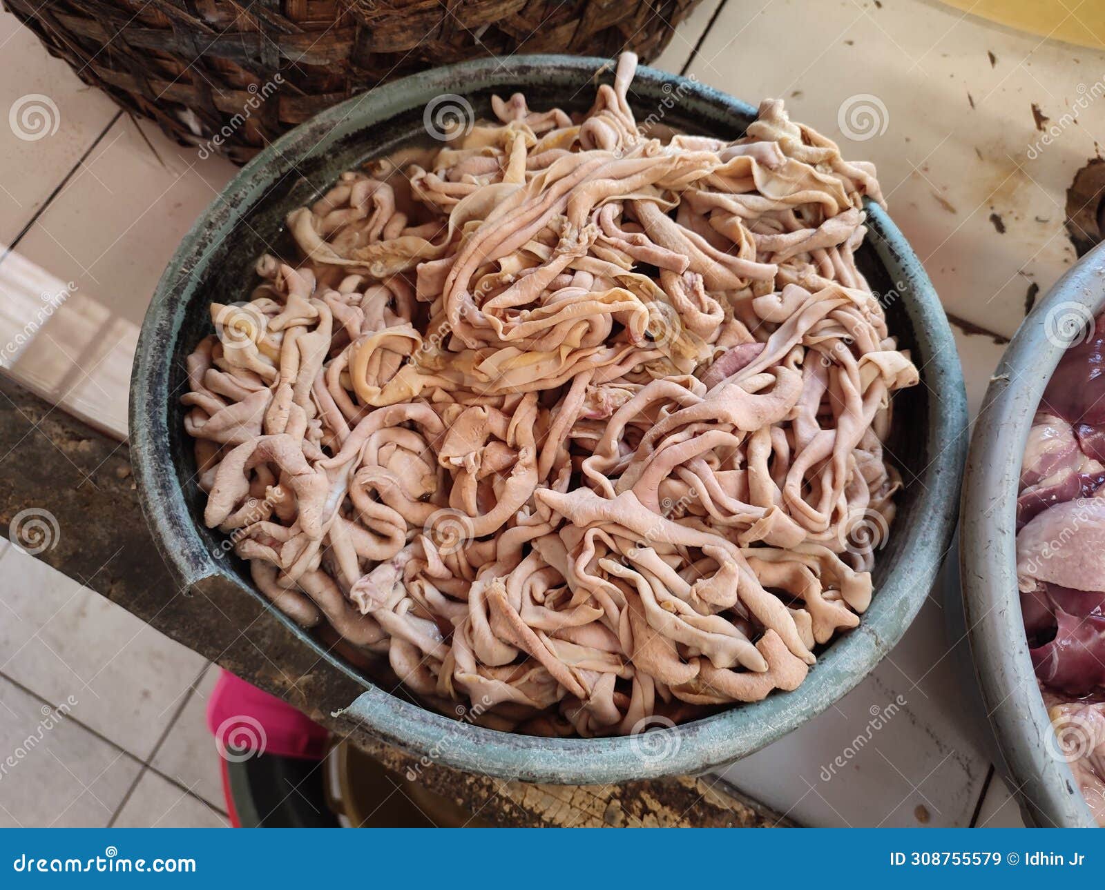 Chicken Intestines on a Traditional Market Table Bucket Served As a