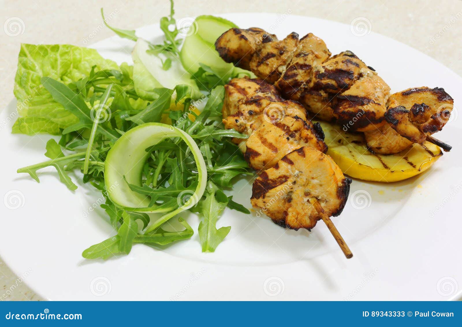 Chicken kebabs side view stock image. Image of salad 89343333